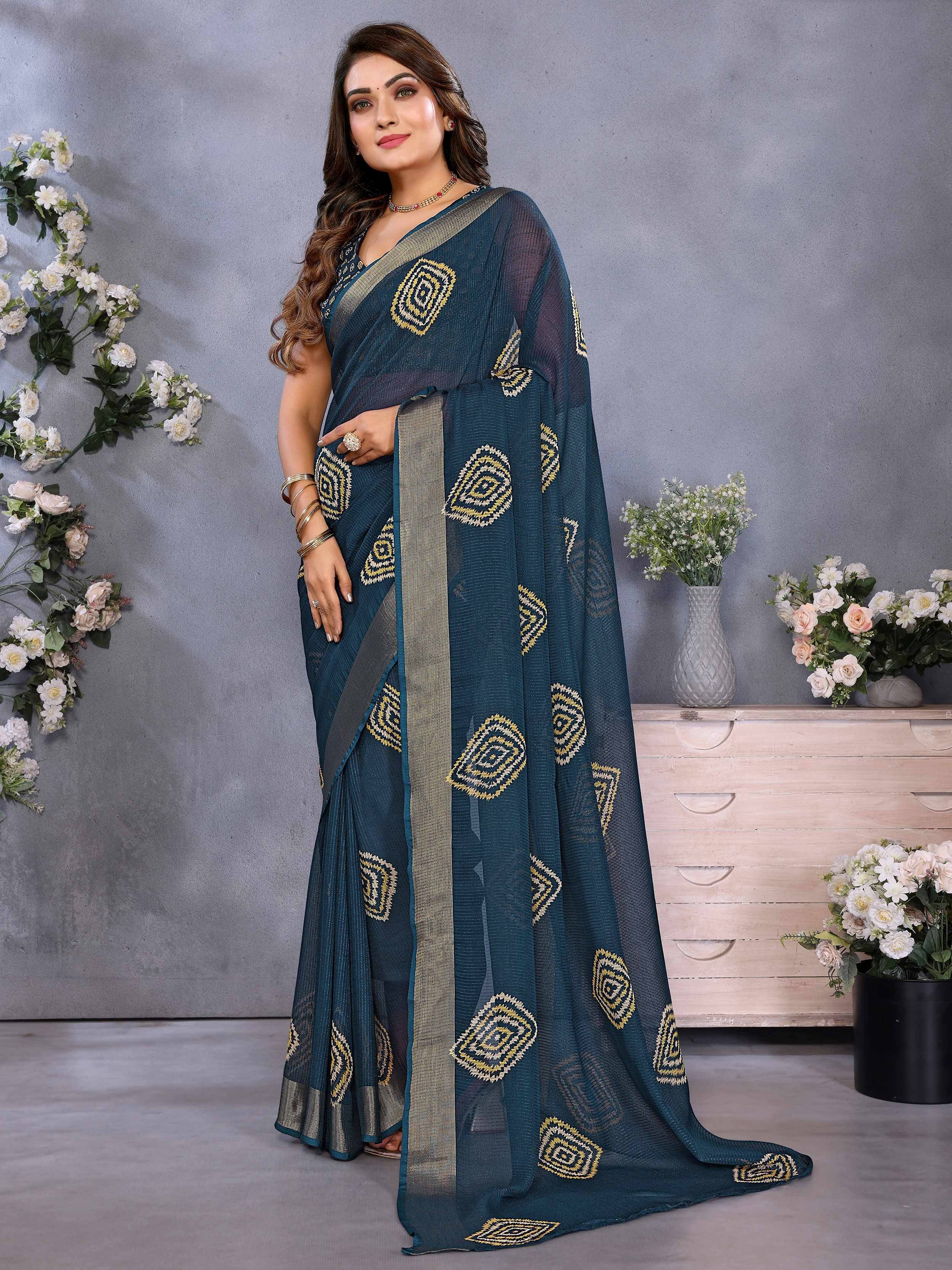 Teal designer saree with gold geometric embroidery, perfect for Indian ethnic wear occasions.