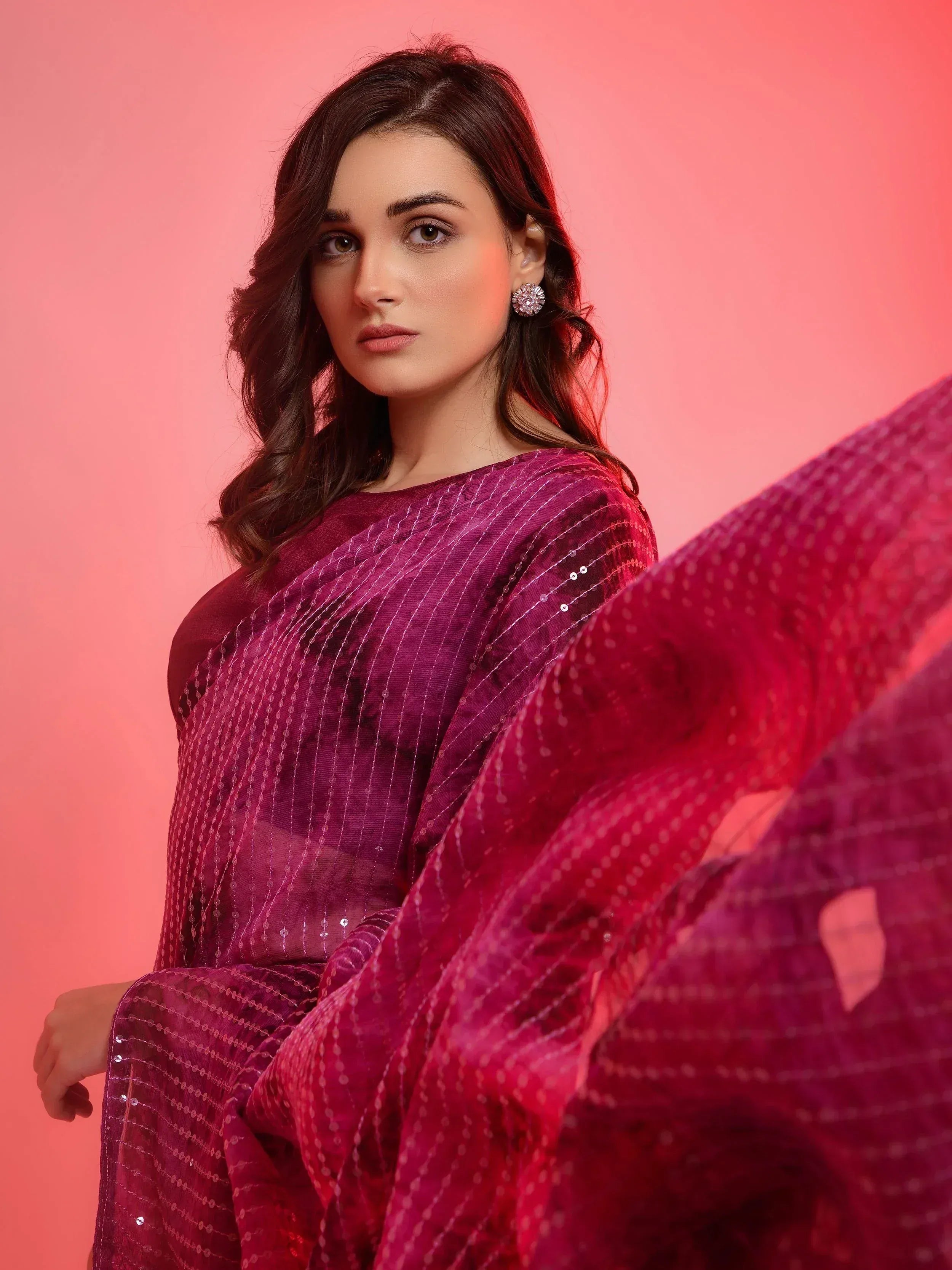 Elegant purple saree with sequin detailing, perfect for Indian ethnic wear occasions
