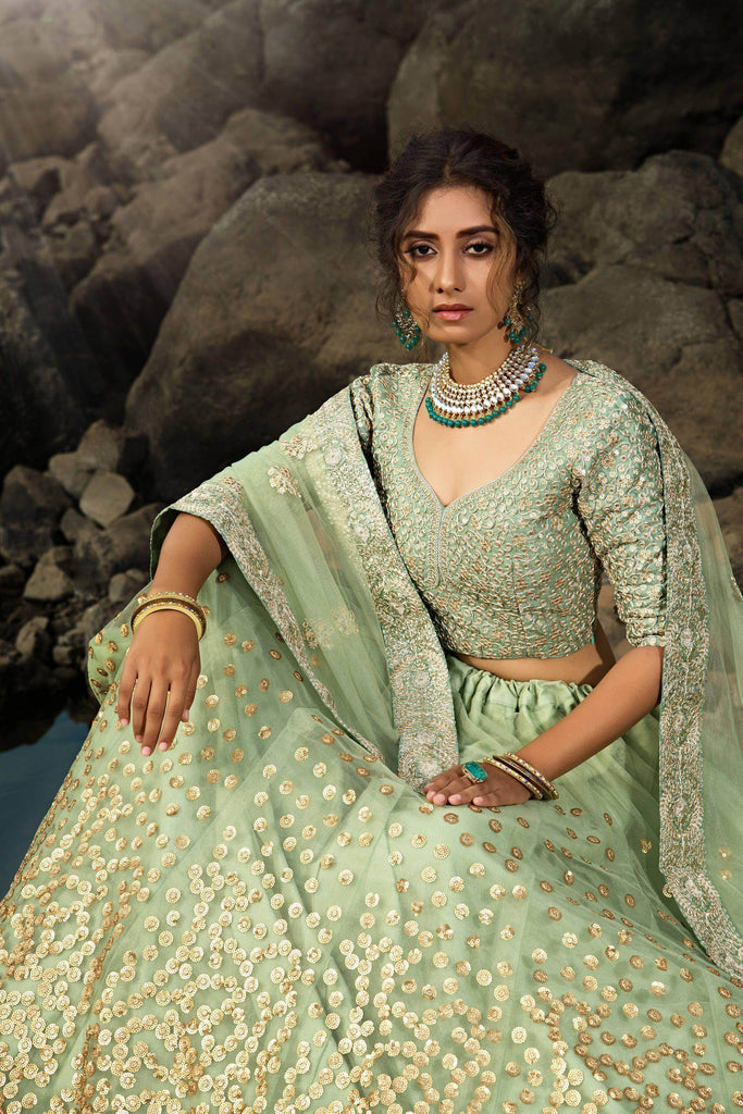 Green Zari Worked Soft Net Wedding Wear Lehenga Choli