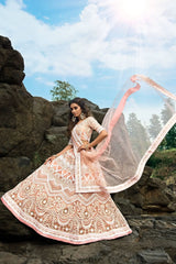 Peach Thread Zari Worked Soft Net Bridal Lehenga Choli