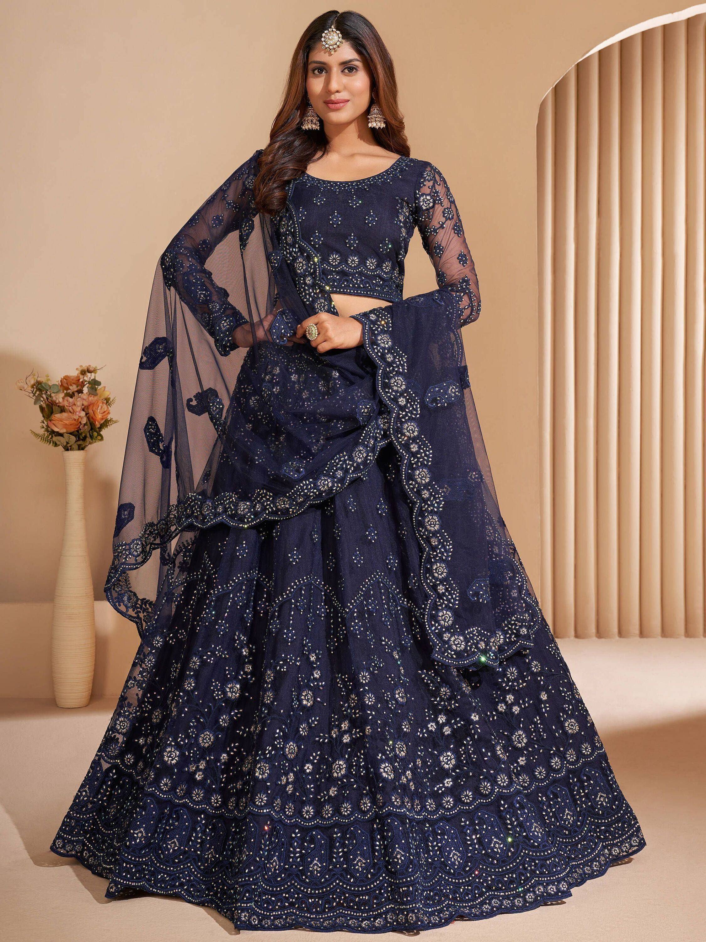 Navy blue designer lehenga choli with heavy embroidery and sheer dupatta for Indian ethnic wear
