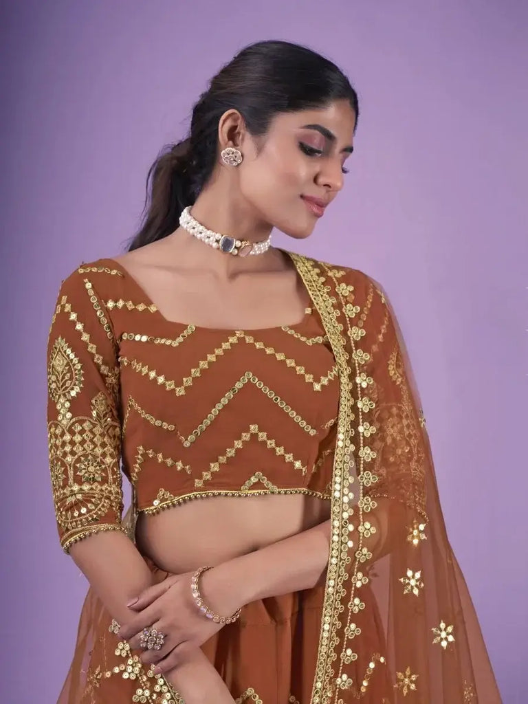 Outstanding Orange Zari Work Georgette Party Wear Lehenga Choli