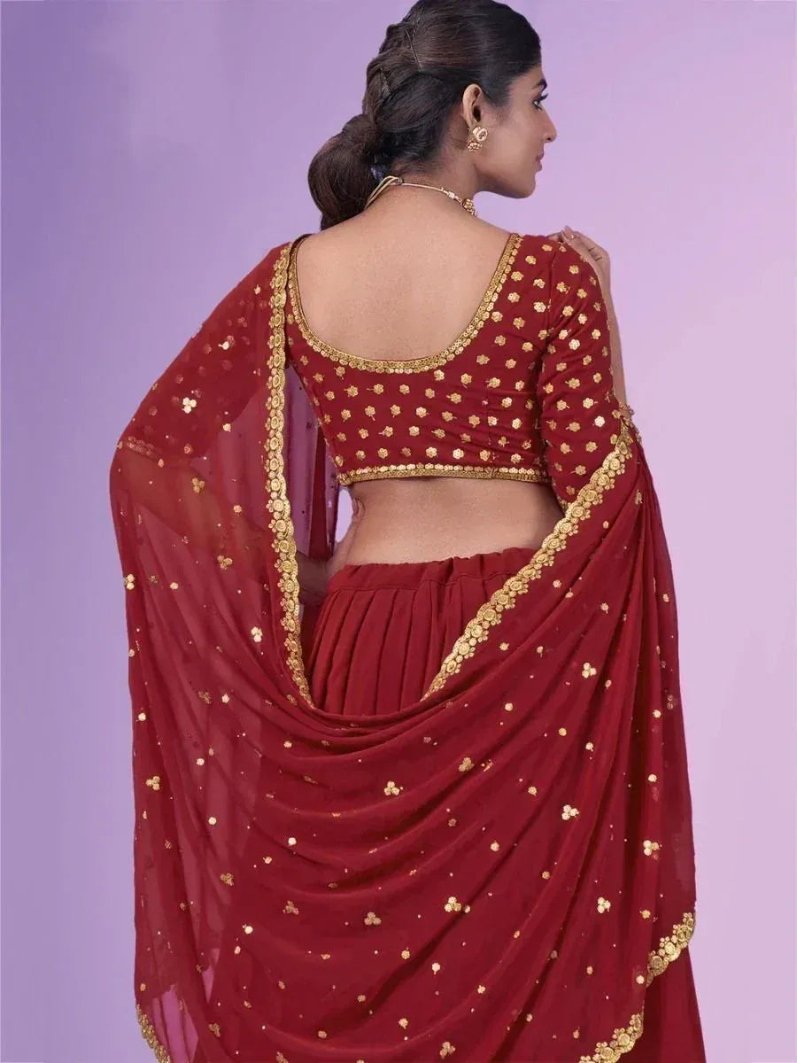Maroon ethnic lehenga choli with gold embroidery, back view, Indian designer wear