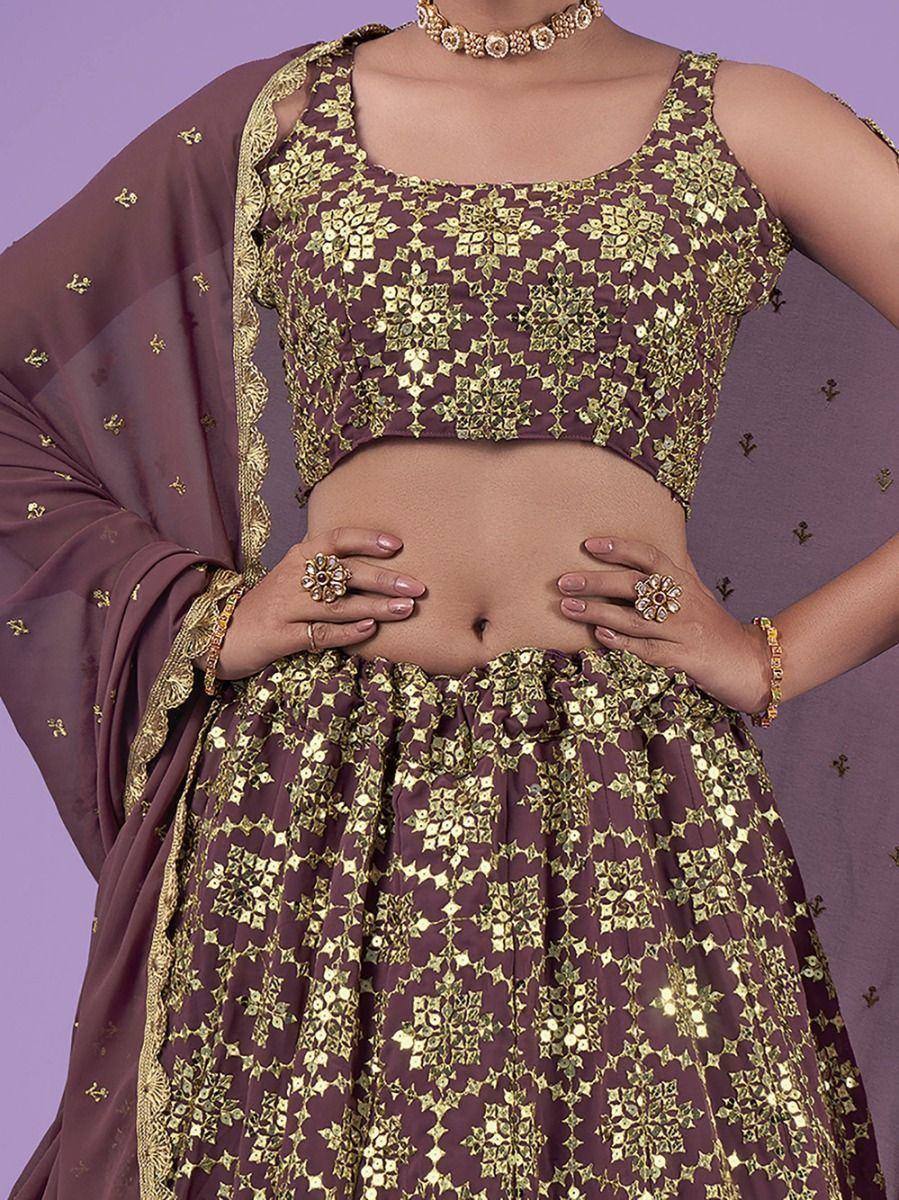 Purple and gold embroidered lehenga choli with matching dupatta, perfect for Indian ethnic wear occasions.
