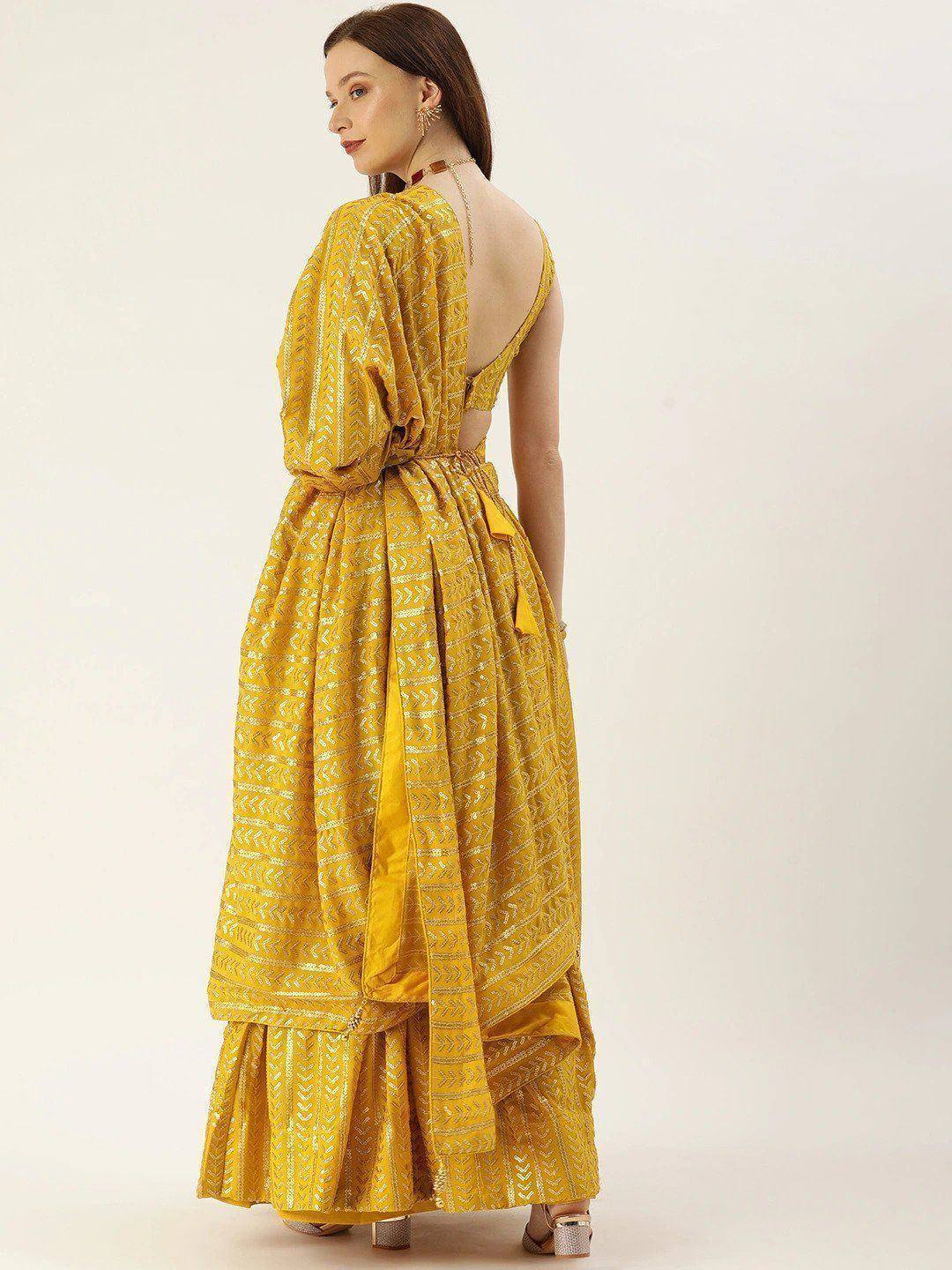 Yellow ethnic gown with backless design and geometric print, perfect for Indian occasions