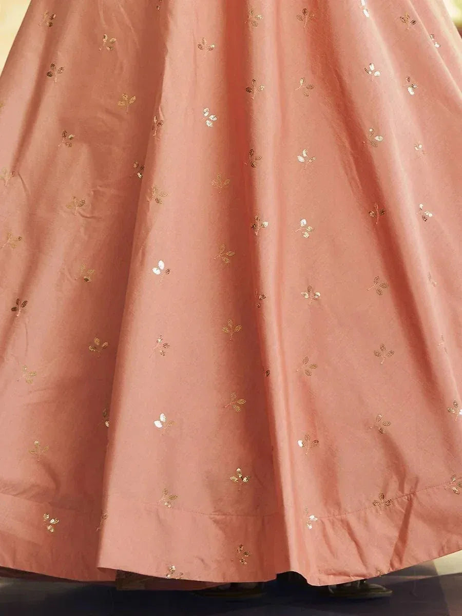 Pink ethnic gown with gold floral embroidery, perfect for Indian festive occasions