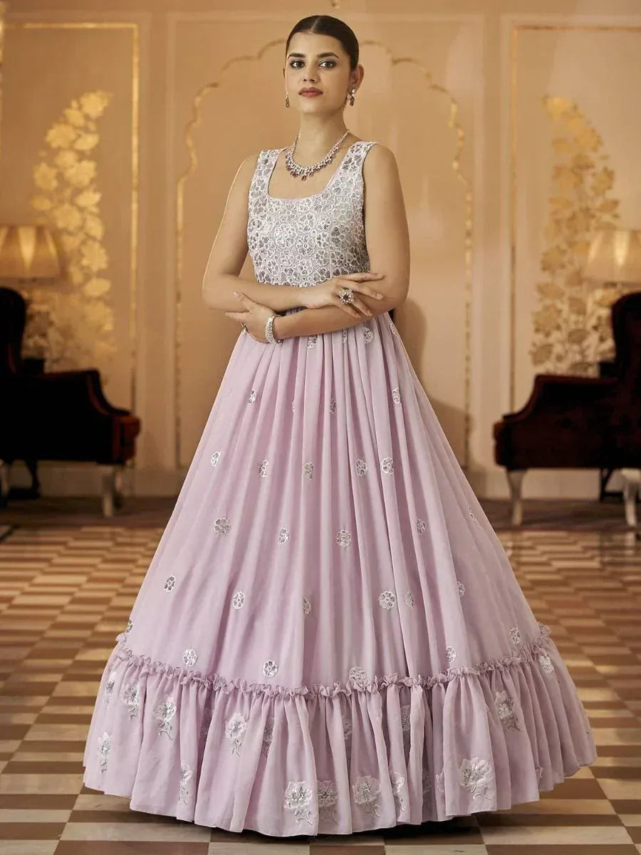 Lavender ethnic gown with silver embroidery, perfect for Indian weddings and festive occasions.
