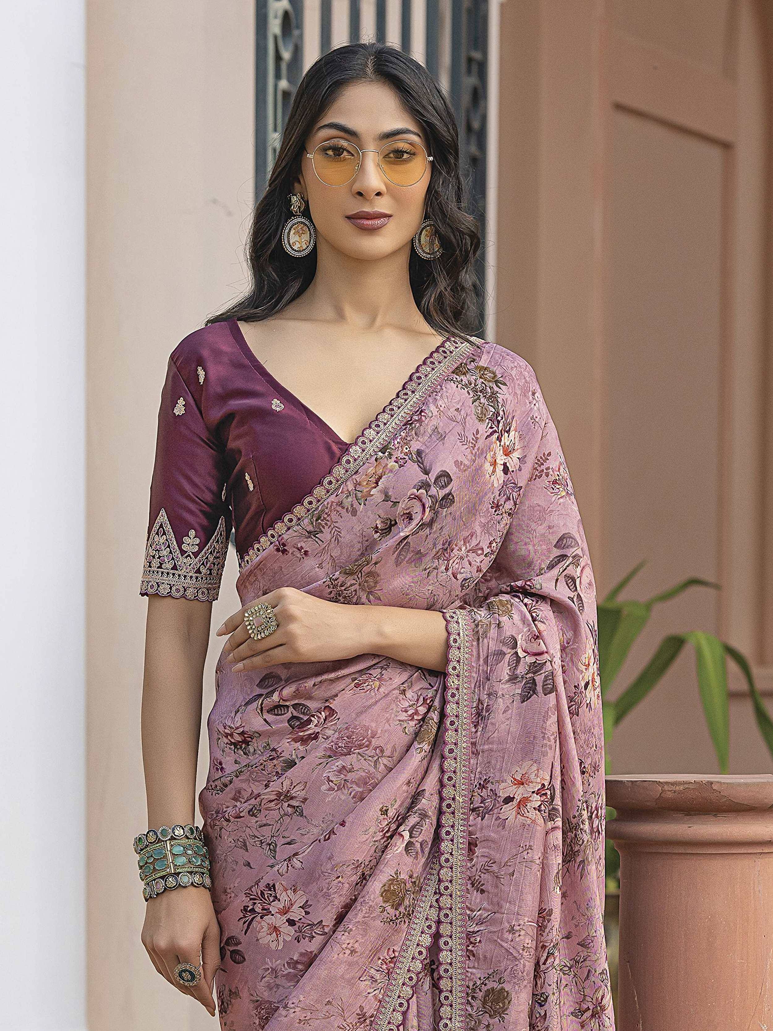 Woman in purple floral saree with embroidered blouse, ethnic Indian wear