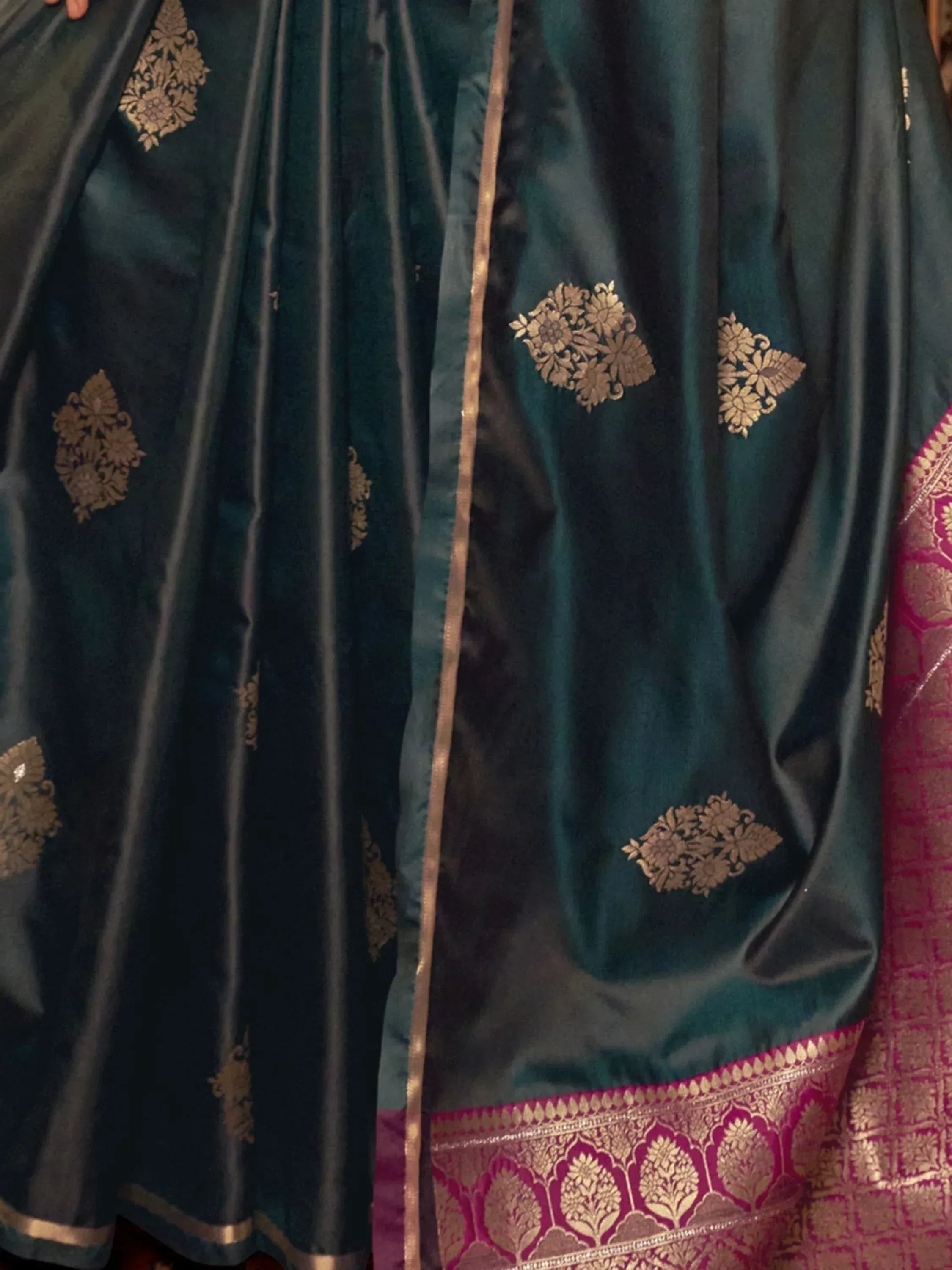 Teal silk lehenga with gold floral embroidery and pink border, Indian ethnic wear