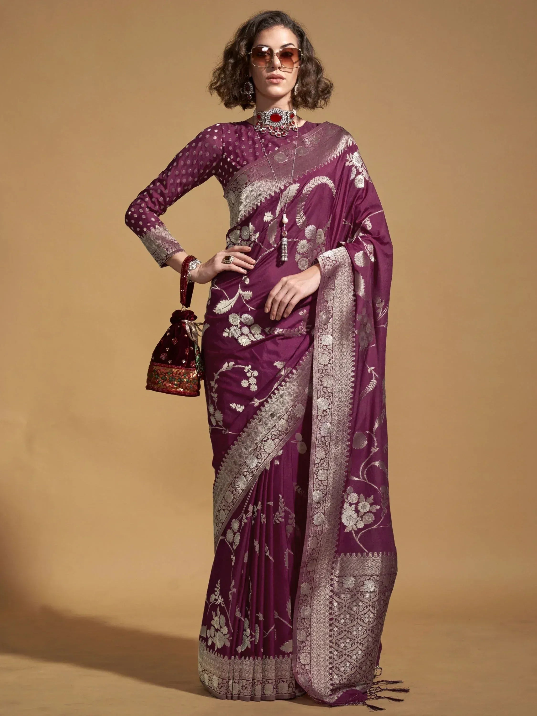 Elegant purple saree with silver floral embroidery, perfect for Indian ethnic wear occasions