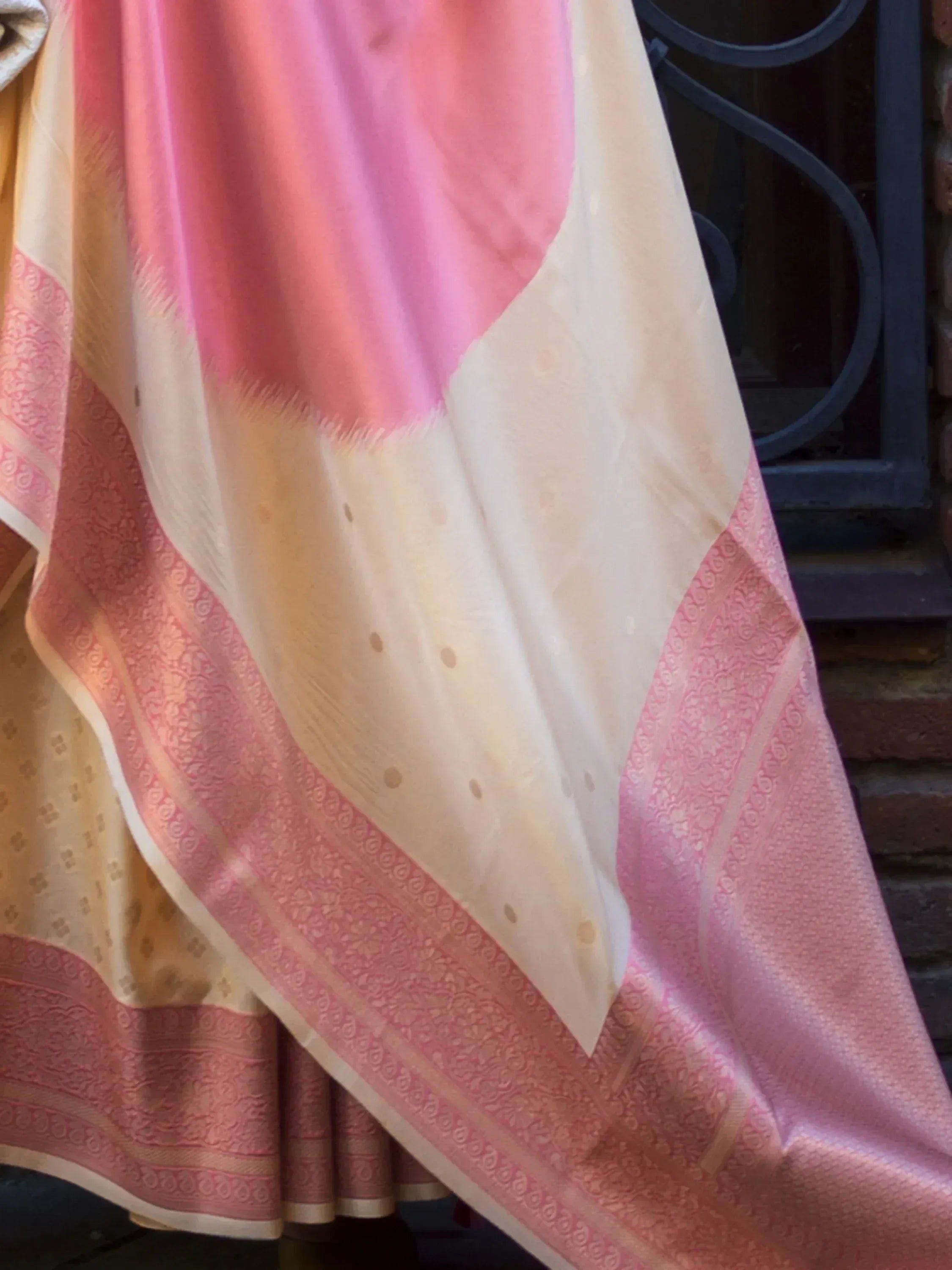 Pink and cream designer saree with intricate border, perfect for ethnic wear