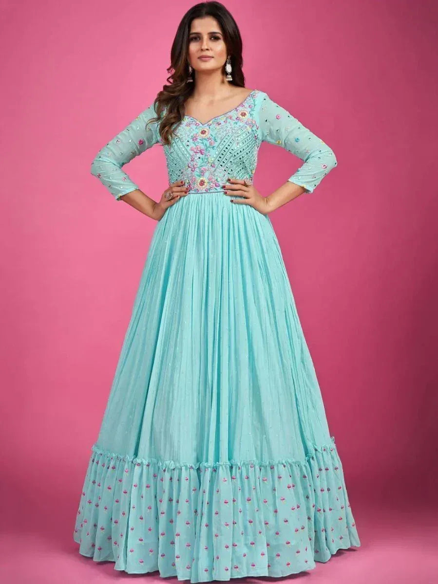 Light blue embroidered ethnic gown with floral detailing, perfect for Indian occasions