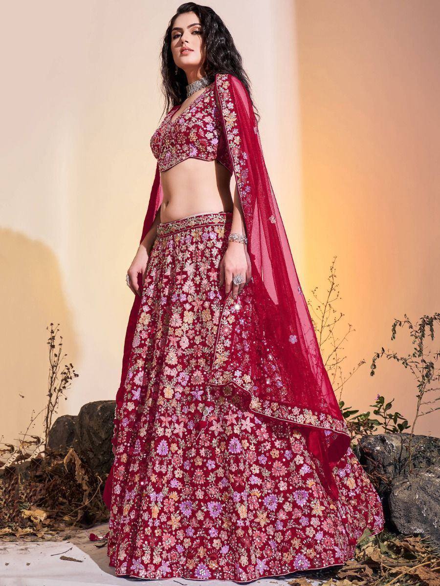 Maroon floral embroidered lehenga choli with sheer dupatta, perfect for Indian weddings and festive occasions