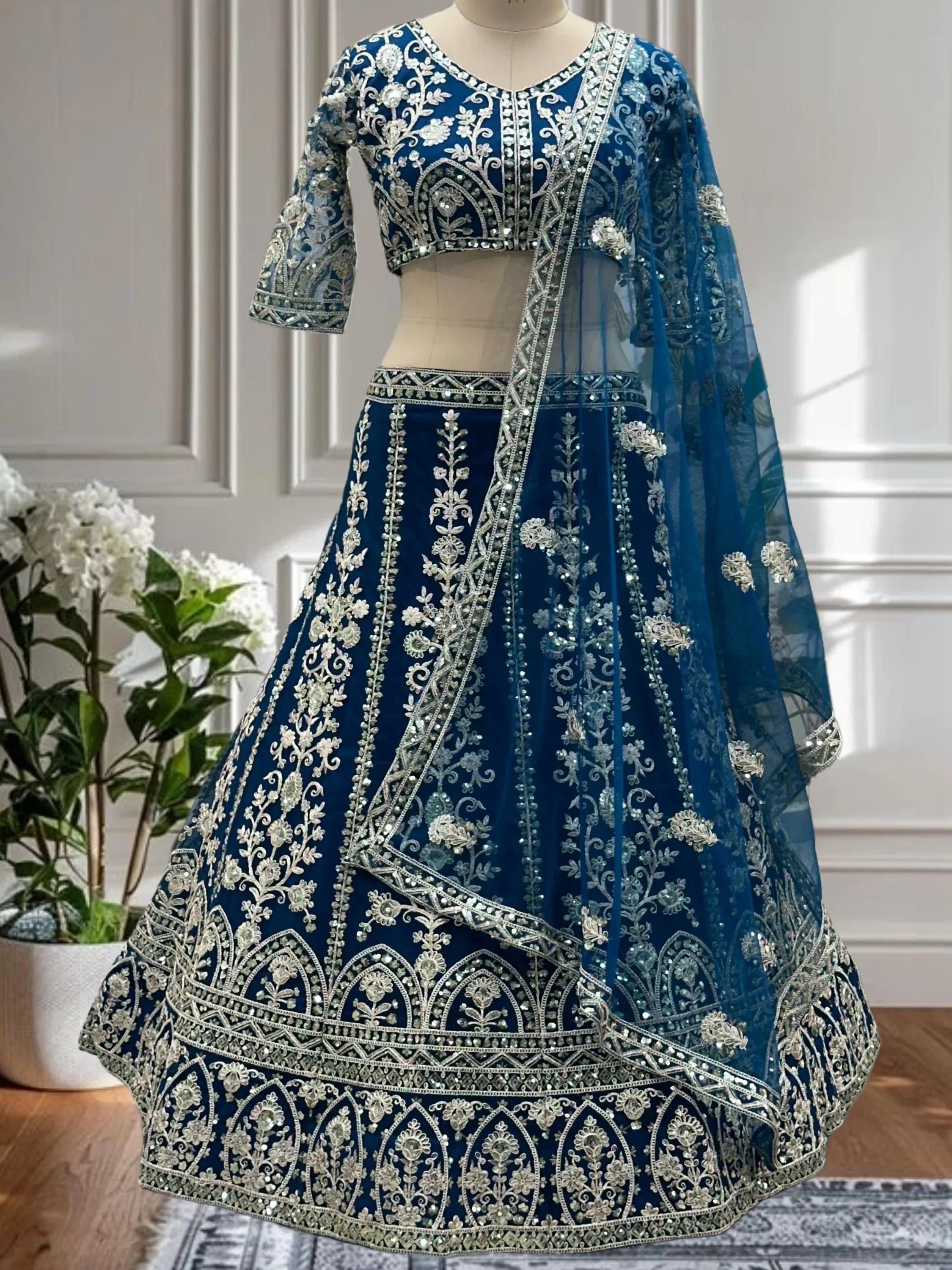Glorious Teal Blue Net Coding Work Reception Wear Lehenga Choli