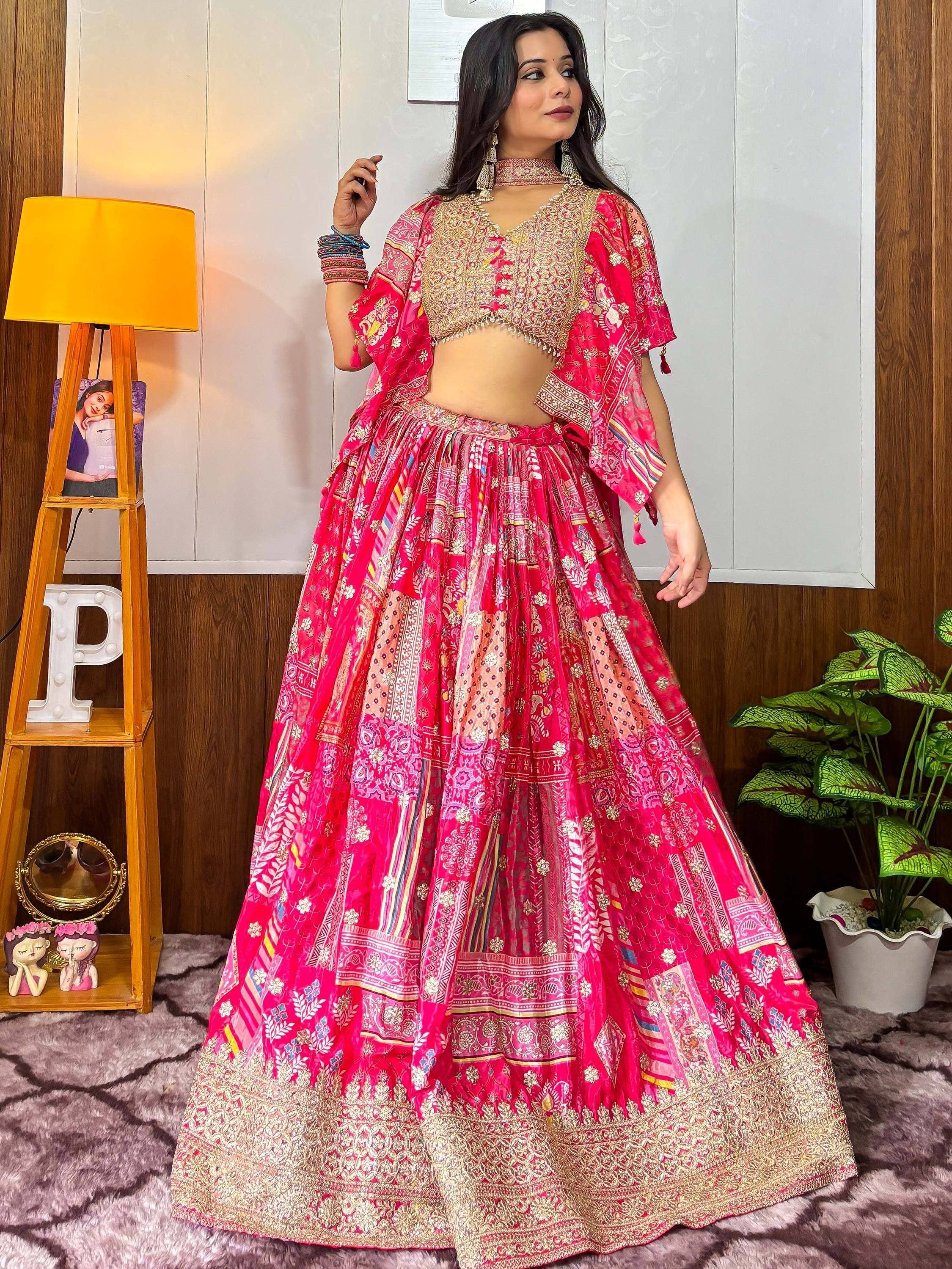 Pink printed lehenga choli with gold embroidery, ethnic Indian wear for women