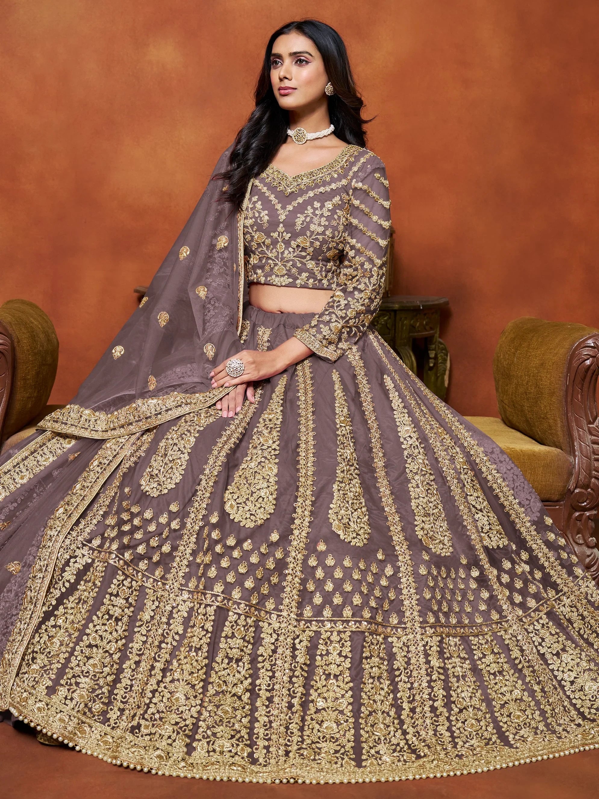 Beautiful Dusty Brown Zari Work Net Reception Wear Lehenga Choli