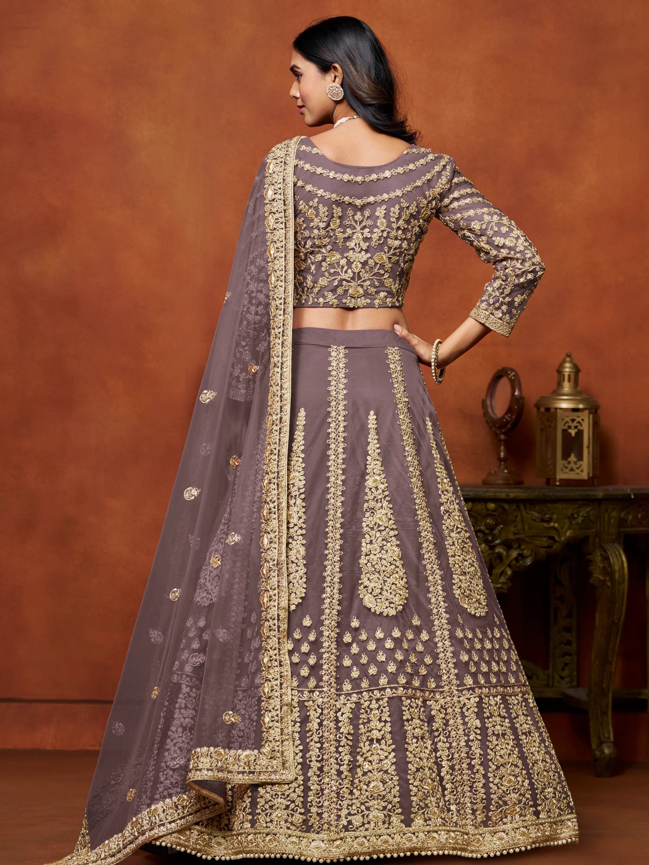 Beautiful Dusty Brown Zari Work Net Reception Wear Lehenga Choli