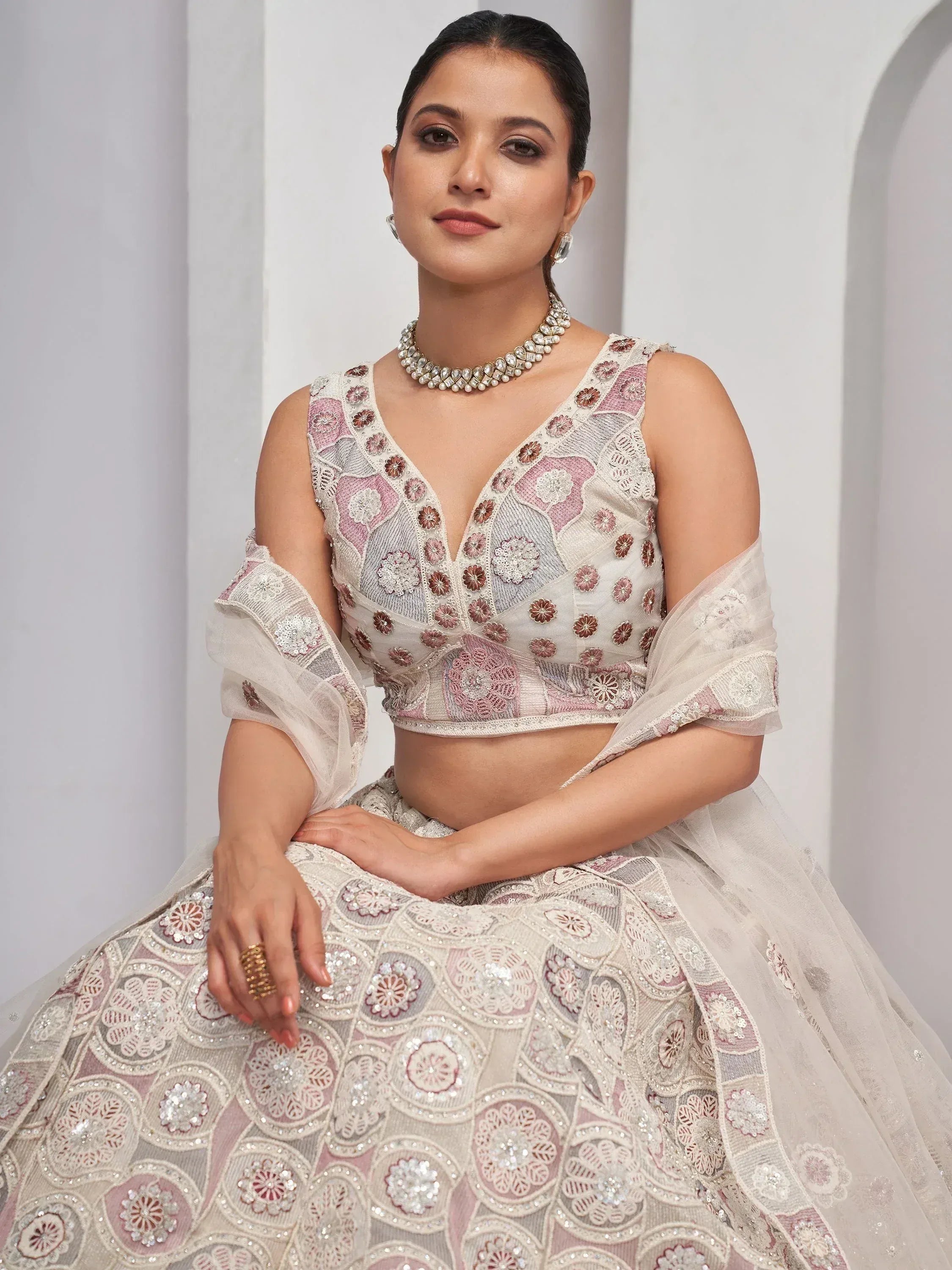 Elegant Indian ethnic lehenga choli with floral embroidery and sheer sleeves