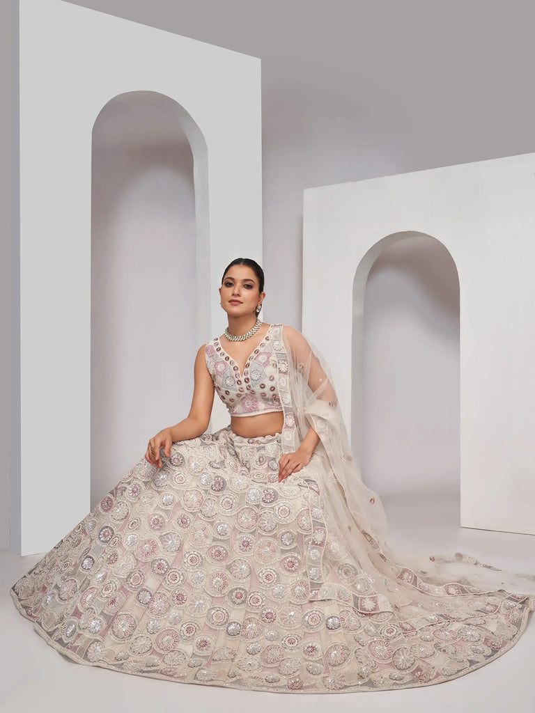 Impressive Ivory Embroidered Net Designer Lehenga Choli With Dupatta