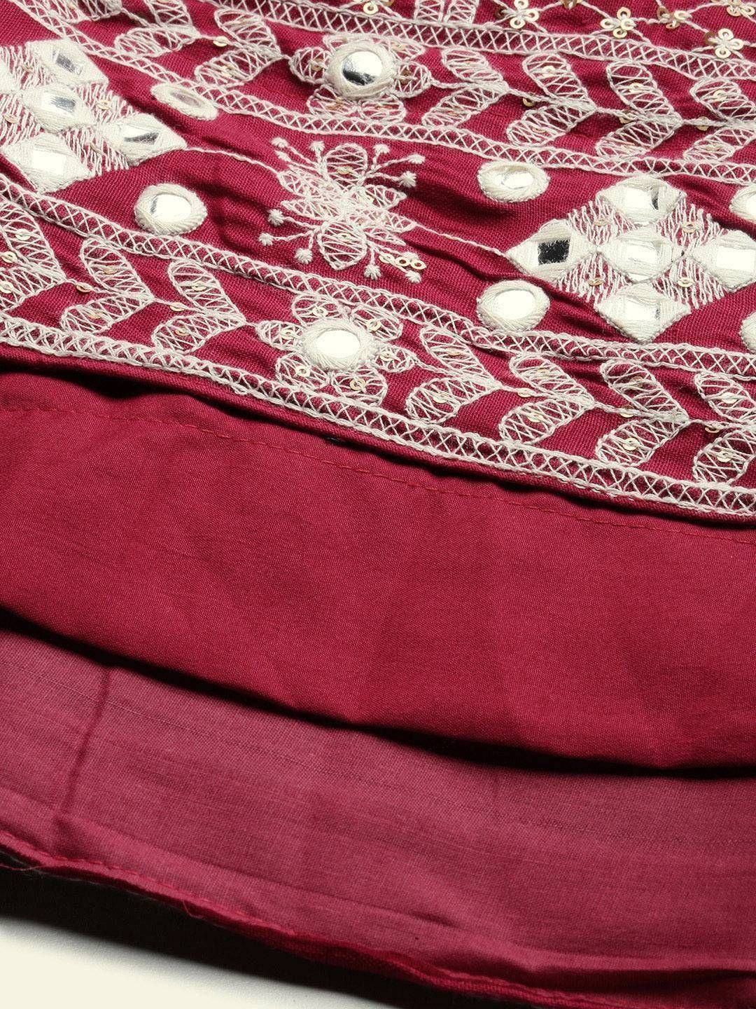 Maroon ethnic wear with white thread embroidery and mirror work detail
