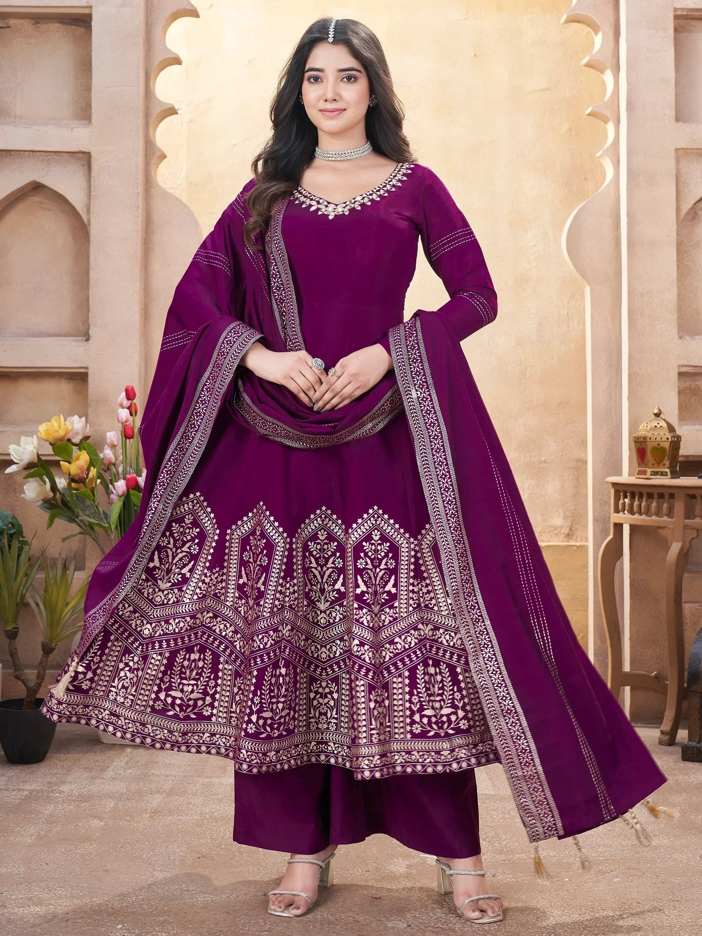 Purple ethnic anarkali suit with silver embroidery, perfect for Indian occasions and festivals.