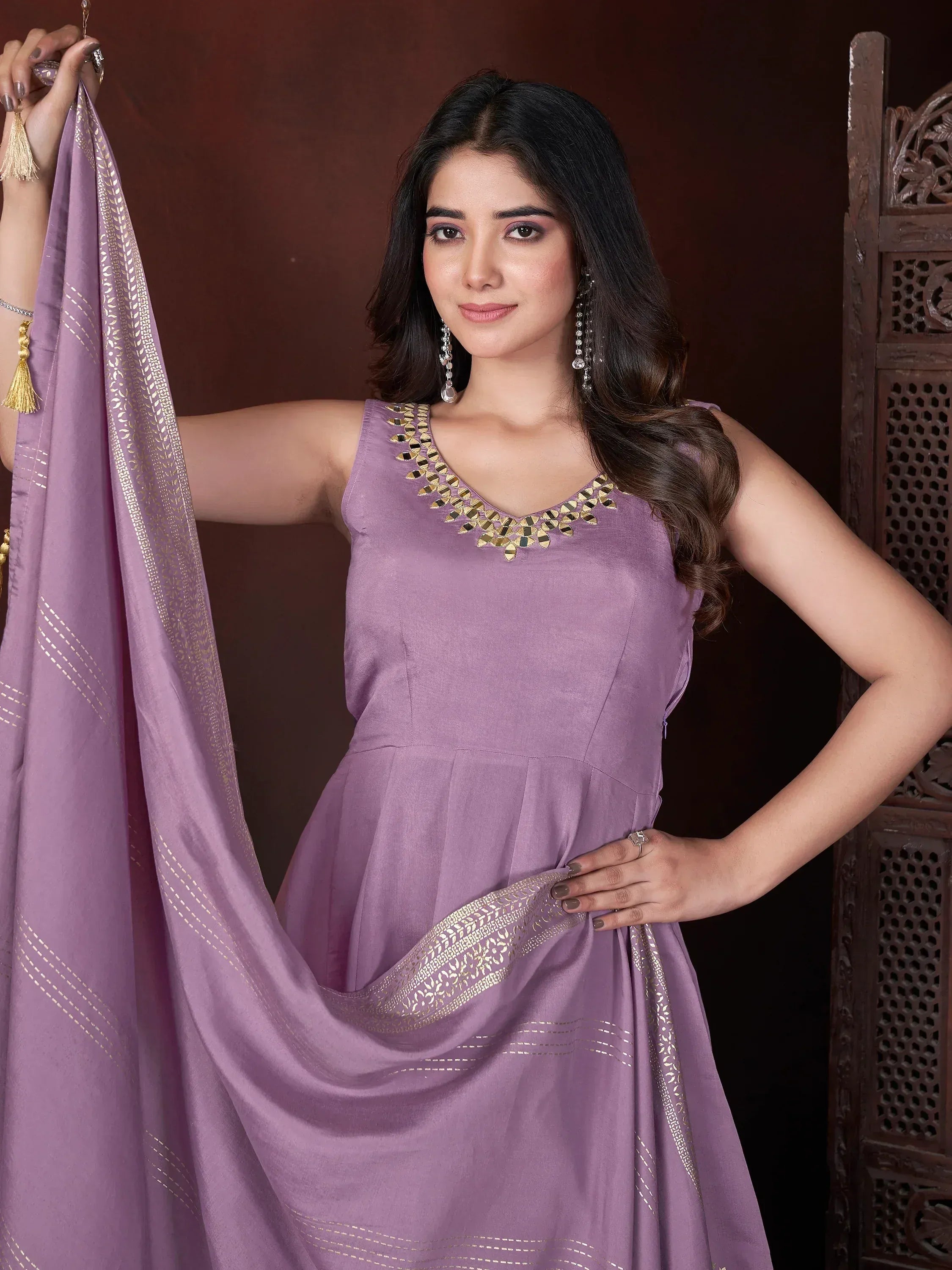 Purple ethnic gown with gold embroidery and matching dupatta, perfect for Indian occasions