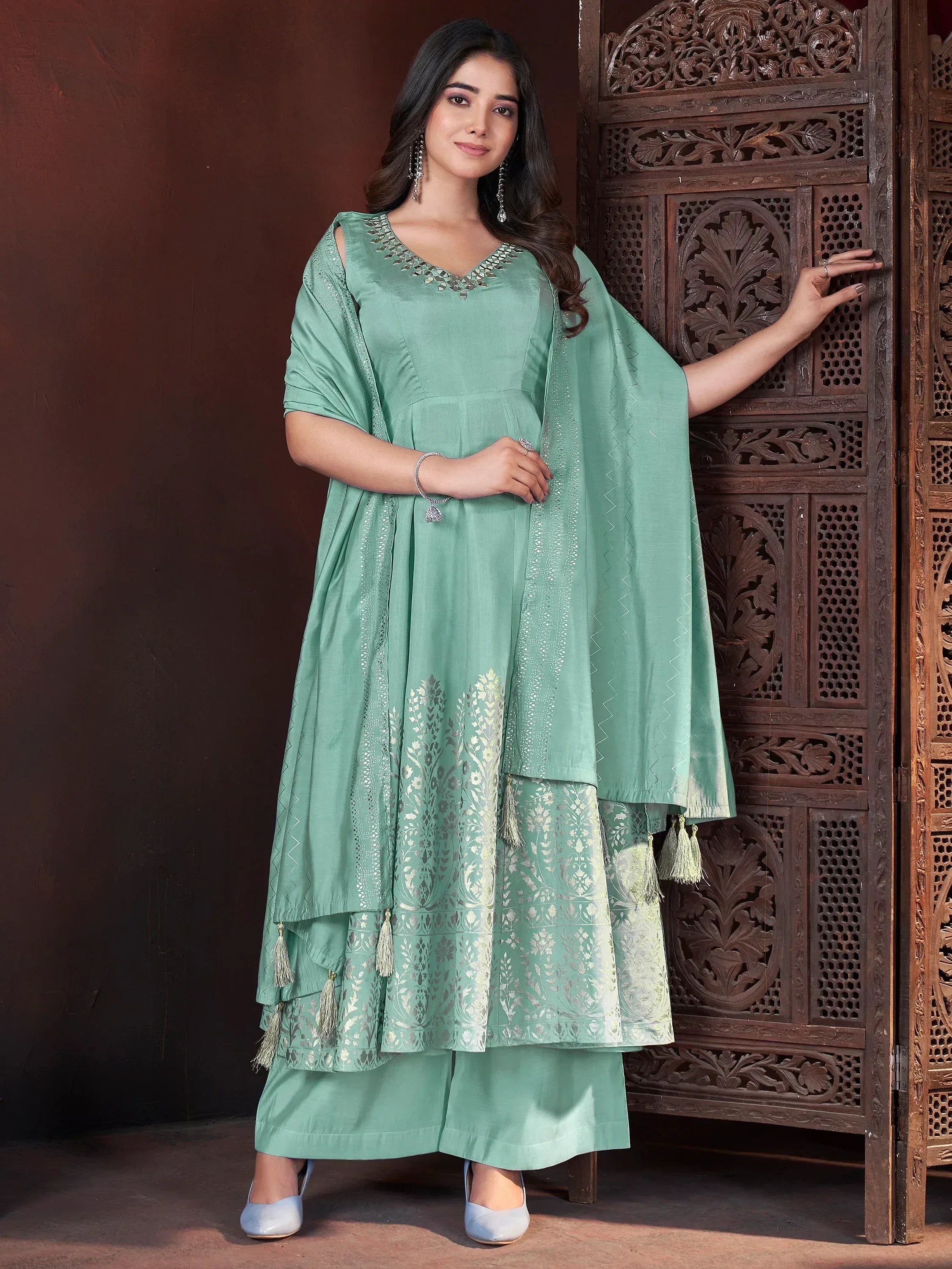 Mint green ethnic anarkali suit with silver embroidery, tassels, and palazzo pants for women