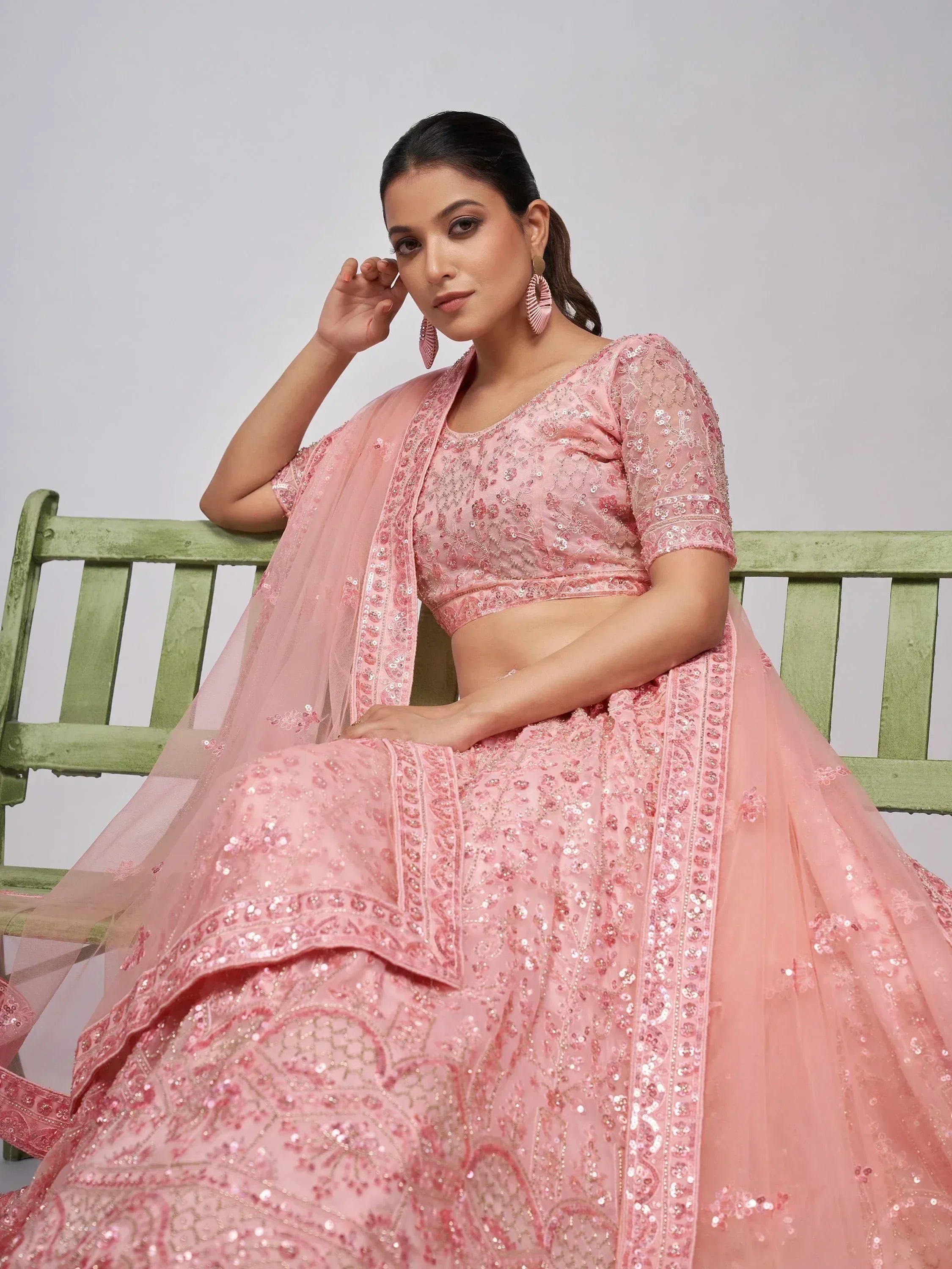 Pink embroidered lehenga choli with sheer dupatta, perfect for Indian ethnic wear occasions