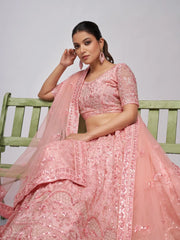 Outstanding Pink Embroidered Net Wedding Wear Lehenga Choli