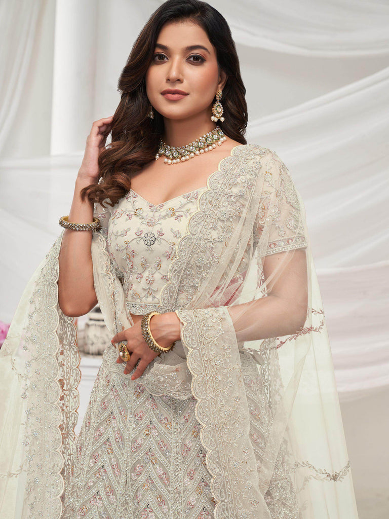 Tantalizing Off-white Embroidered Net Engagement wear Lehenga Choli