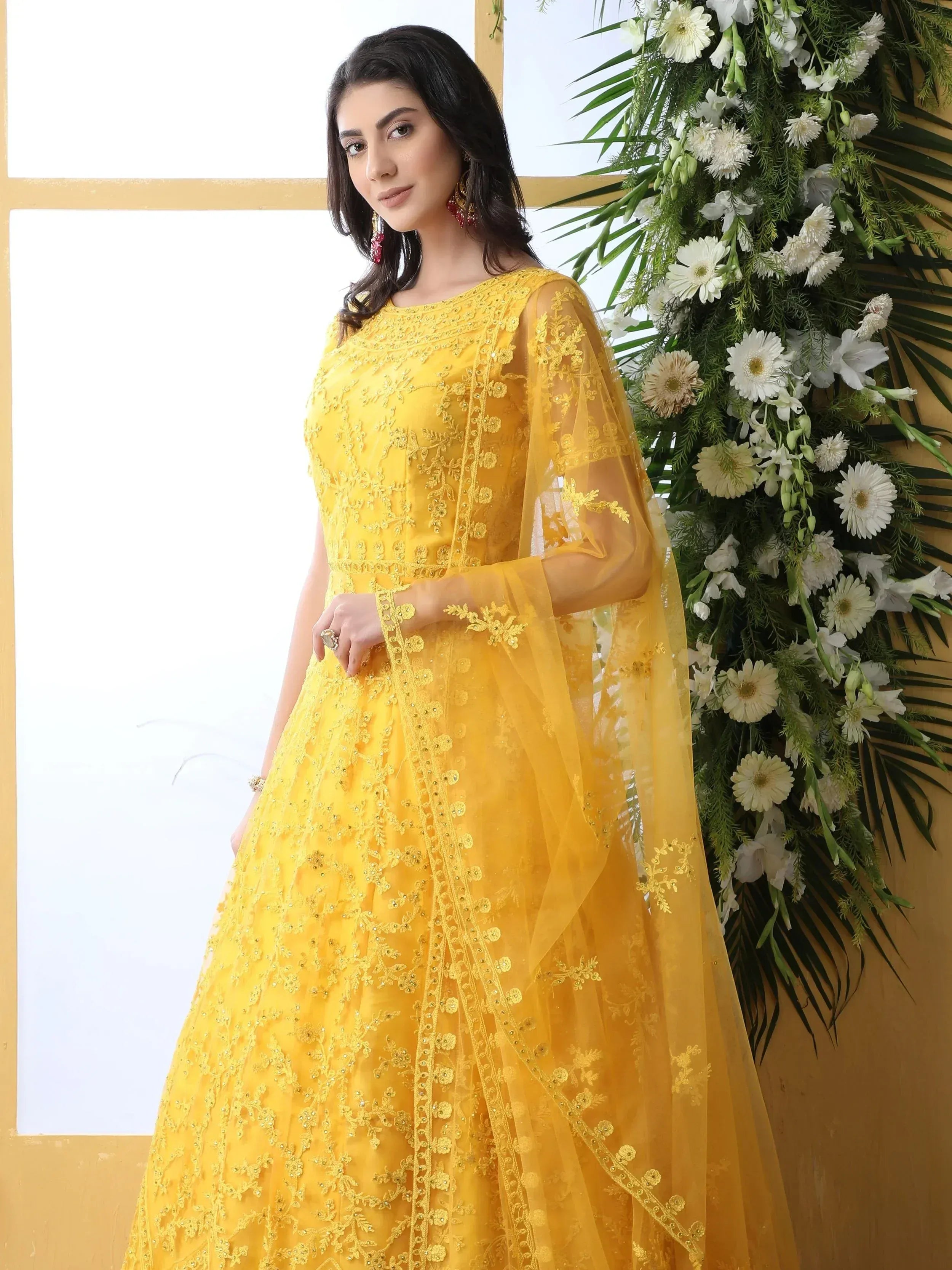 Yellow embroidered anarkali gown with sheer sleeves, perfect for Indian ethnic wear events