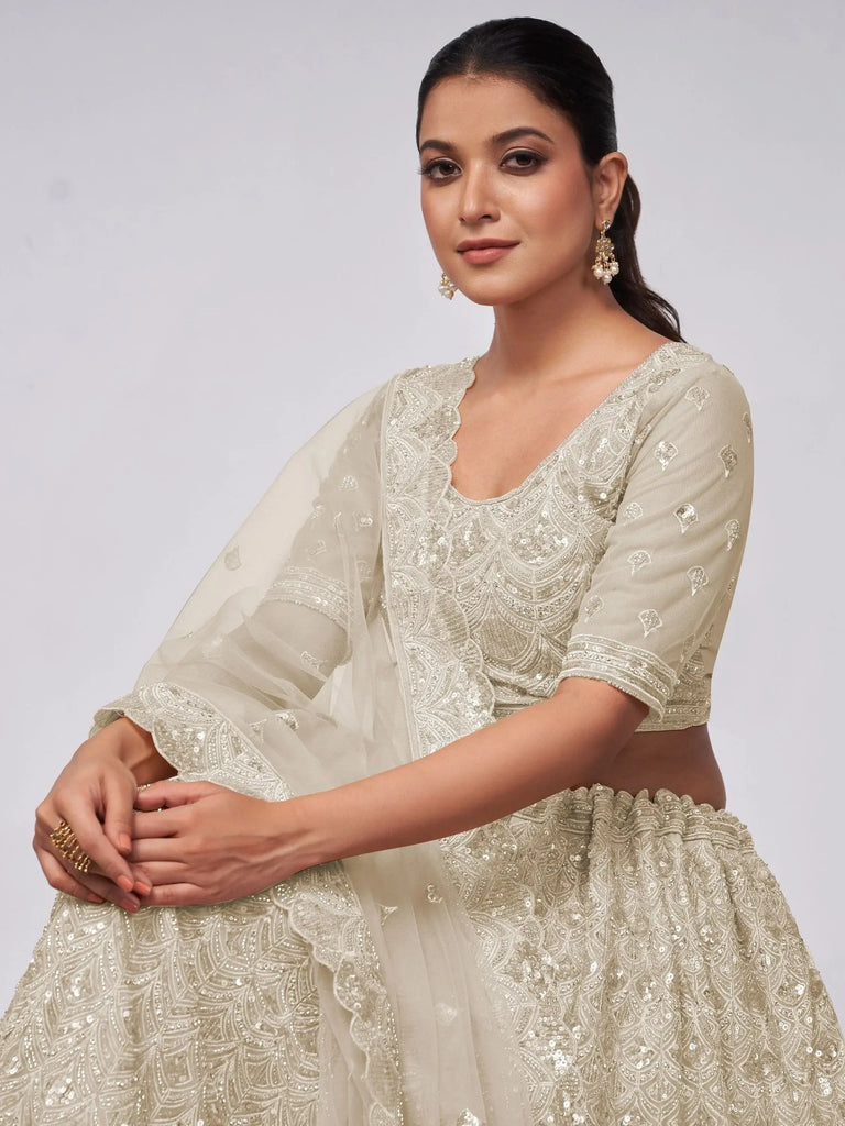 Charismatic Ivory Heavy Sequins Net Bridesmaid Lehenga Choli