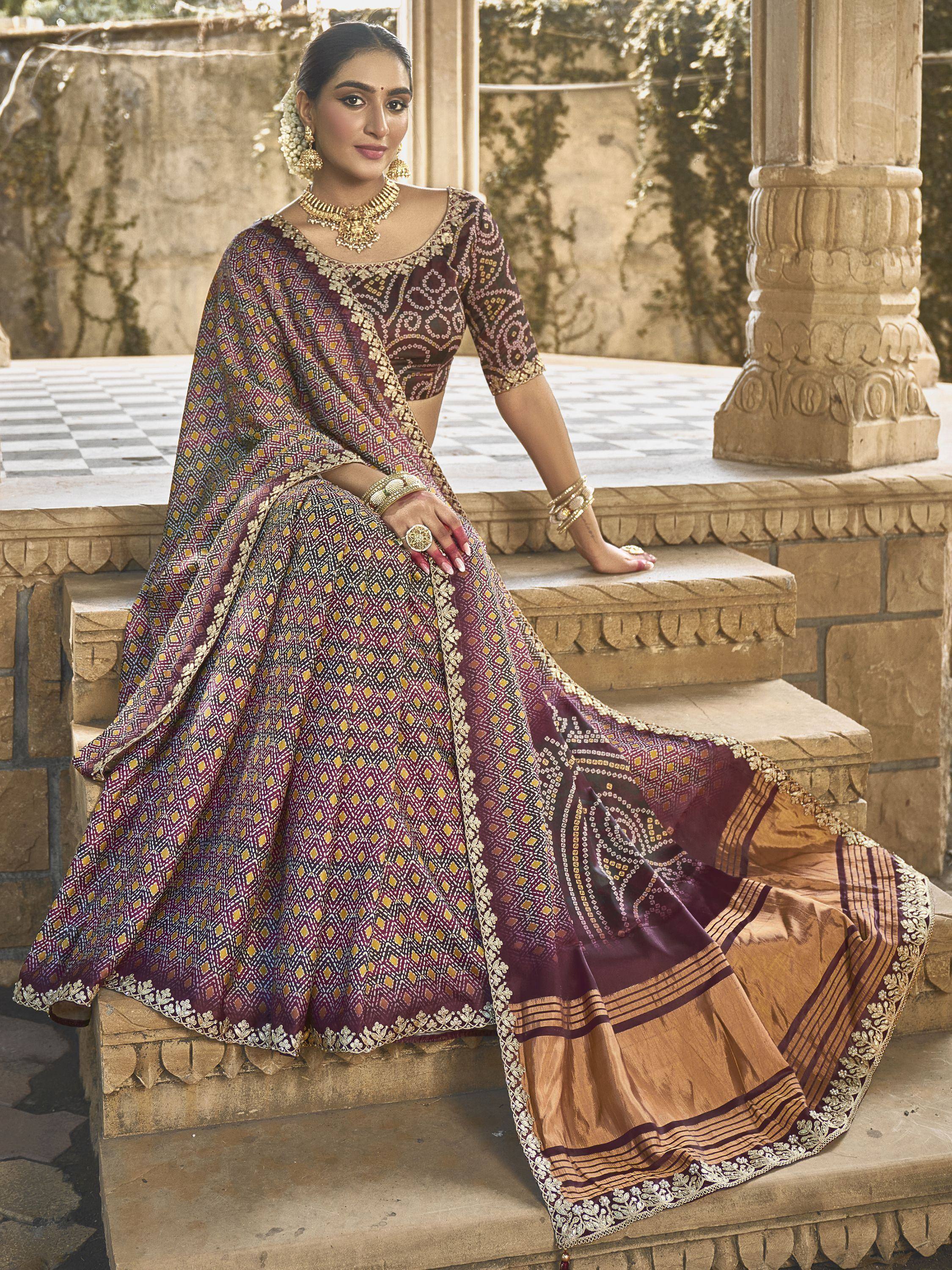 Elegant maroon and gold lehenga choli with intricate geometric print, perfect for Indian ethnic occasions.