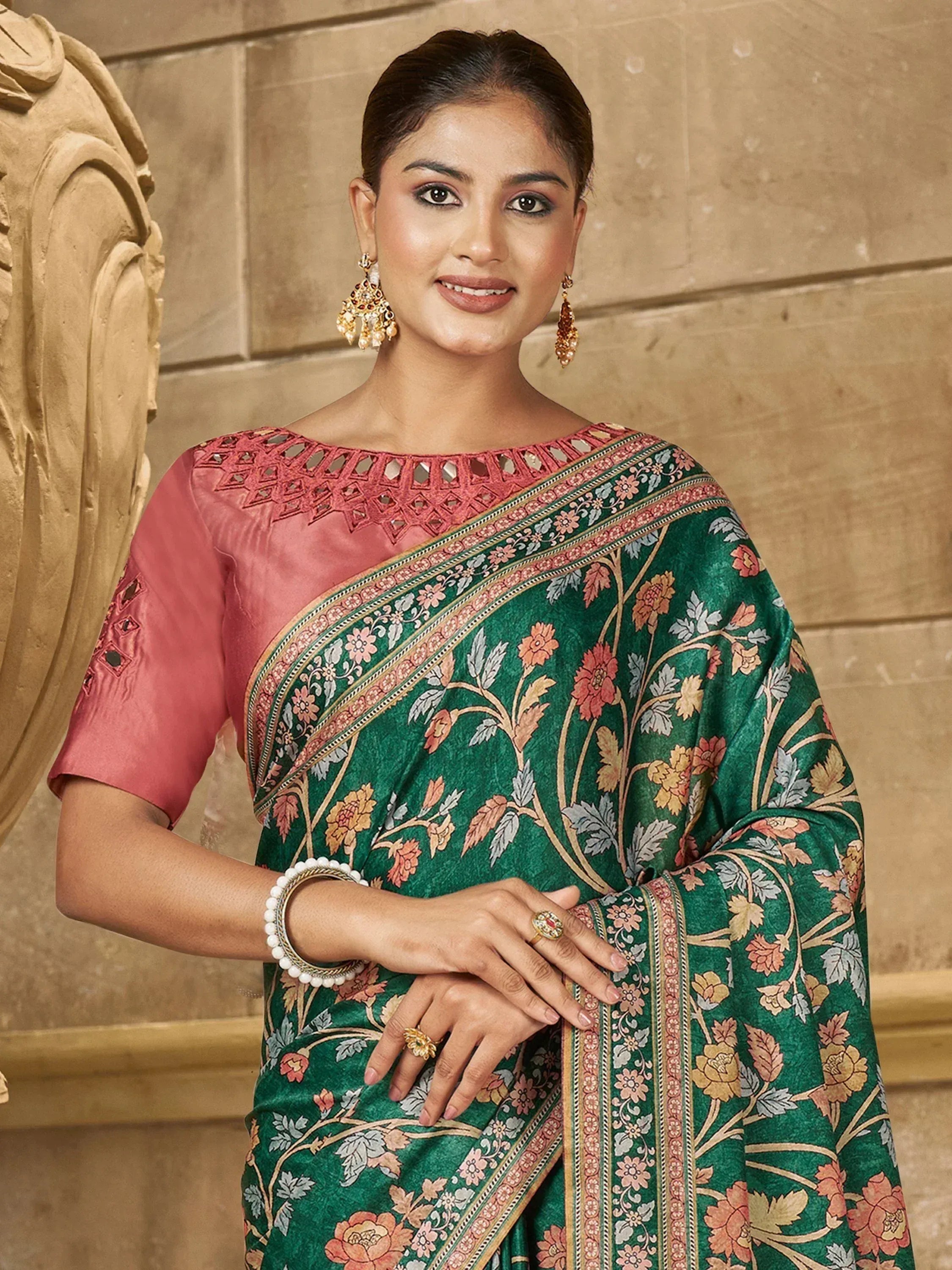 Elegant green floral saree with pink blouse, perfect for Indian ethnic occasions