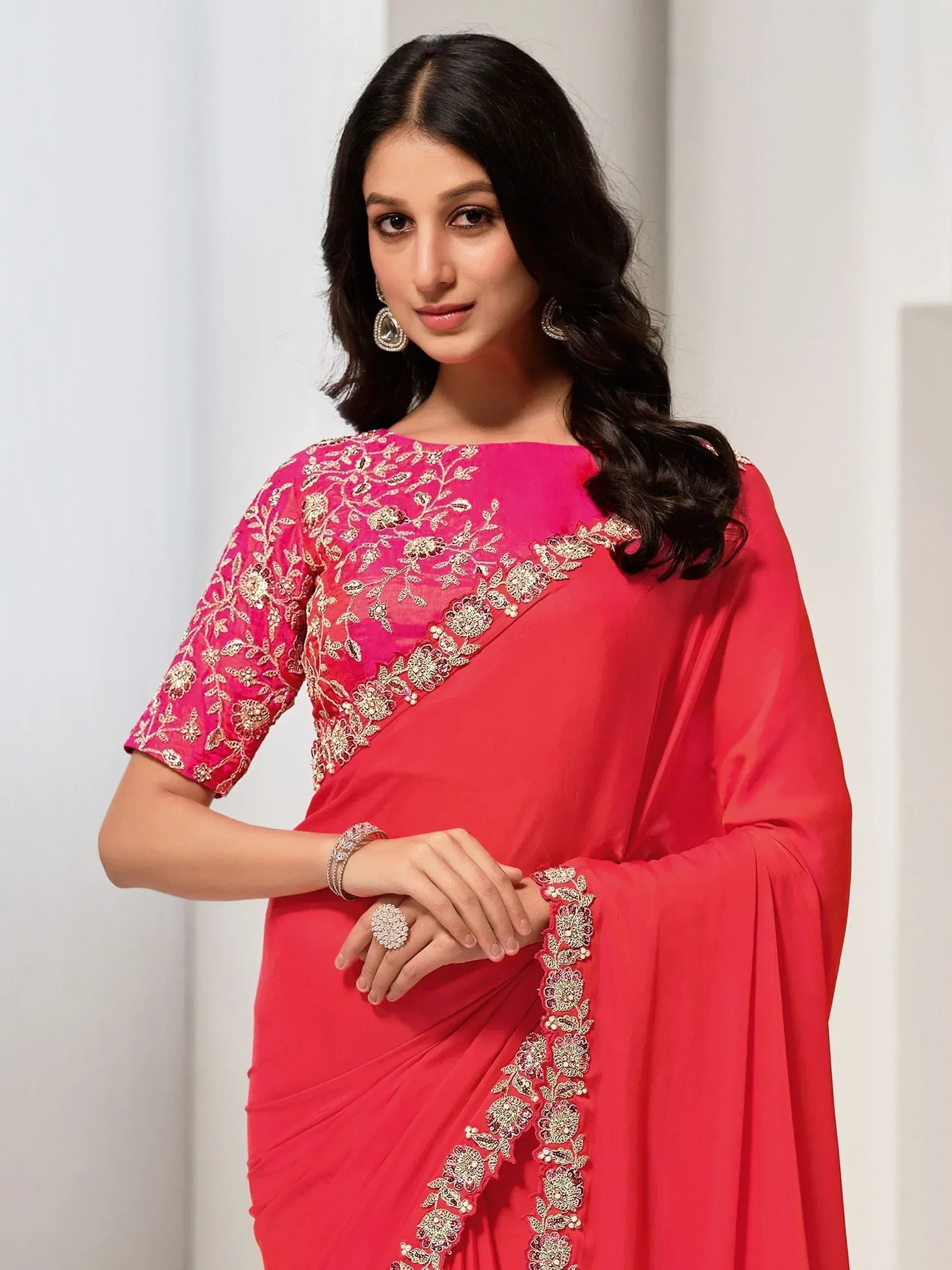 Red embroidered saree with gold floral work, perfect for Indian ethnic occasions