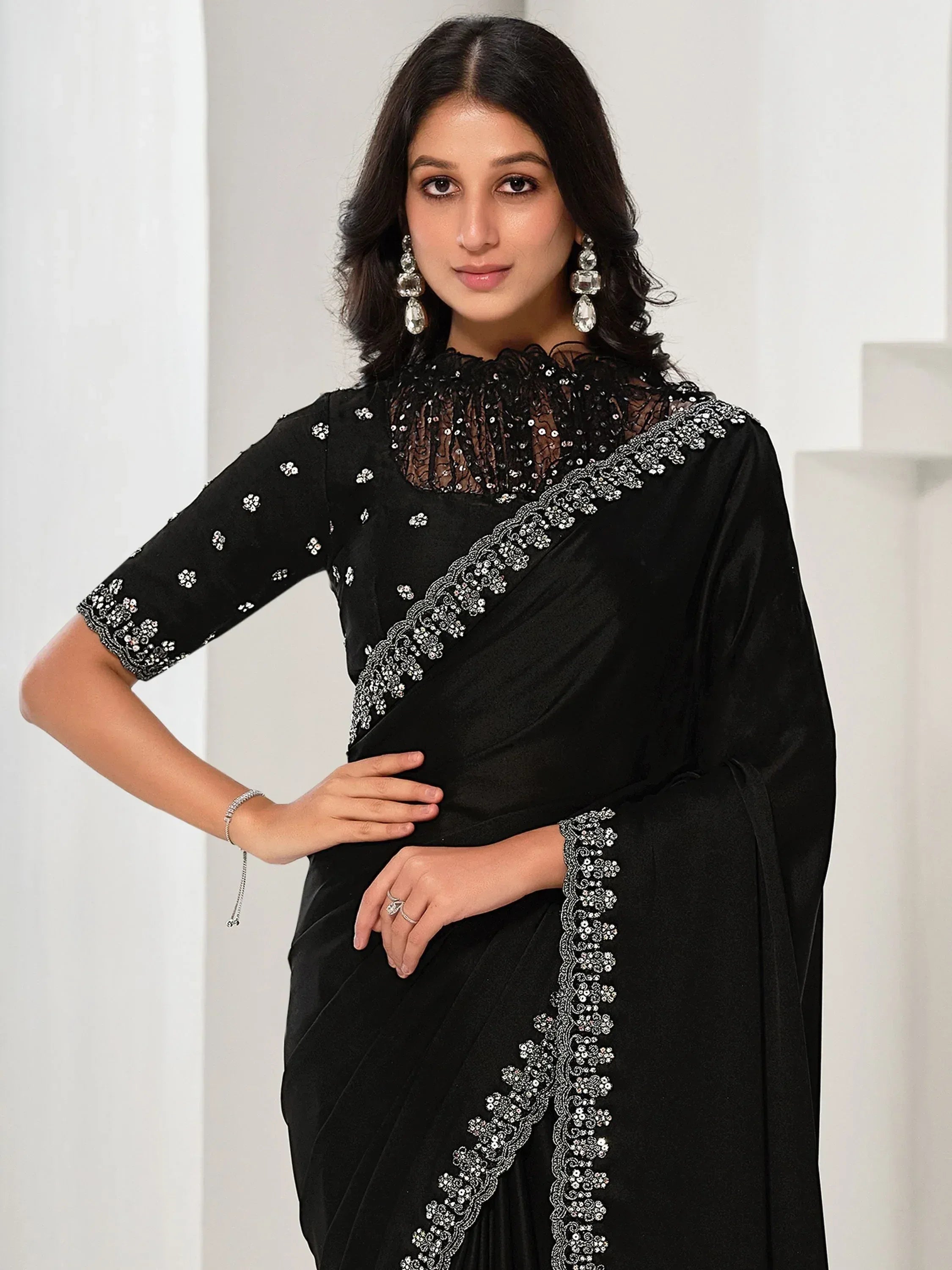 Black embroidered saree with sequin work and lace blouse, elegant Indian ethnic wear