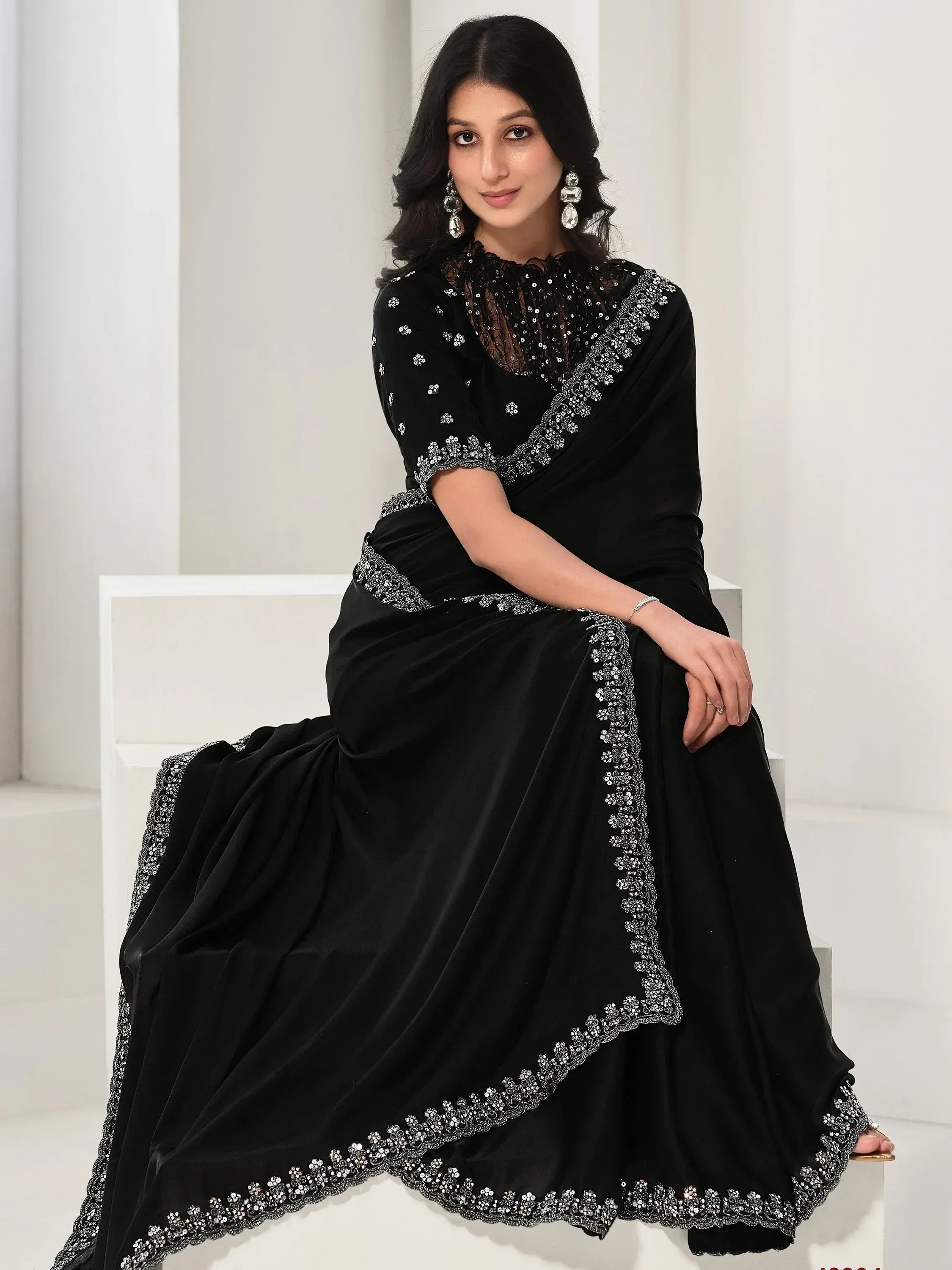 Black velvet saree with silver embroidery, perfect for Indian ethnic wear events