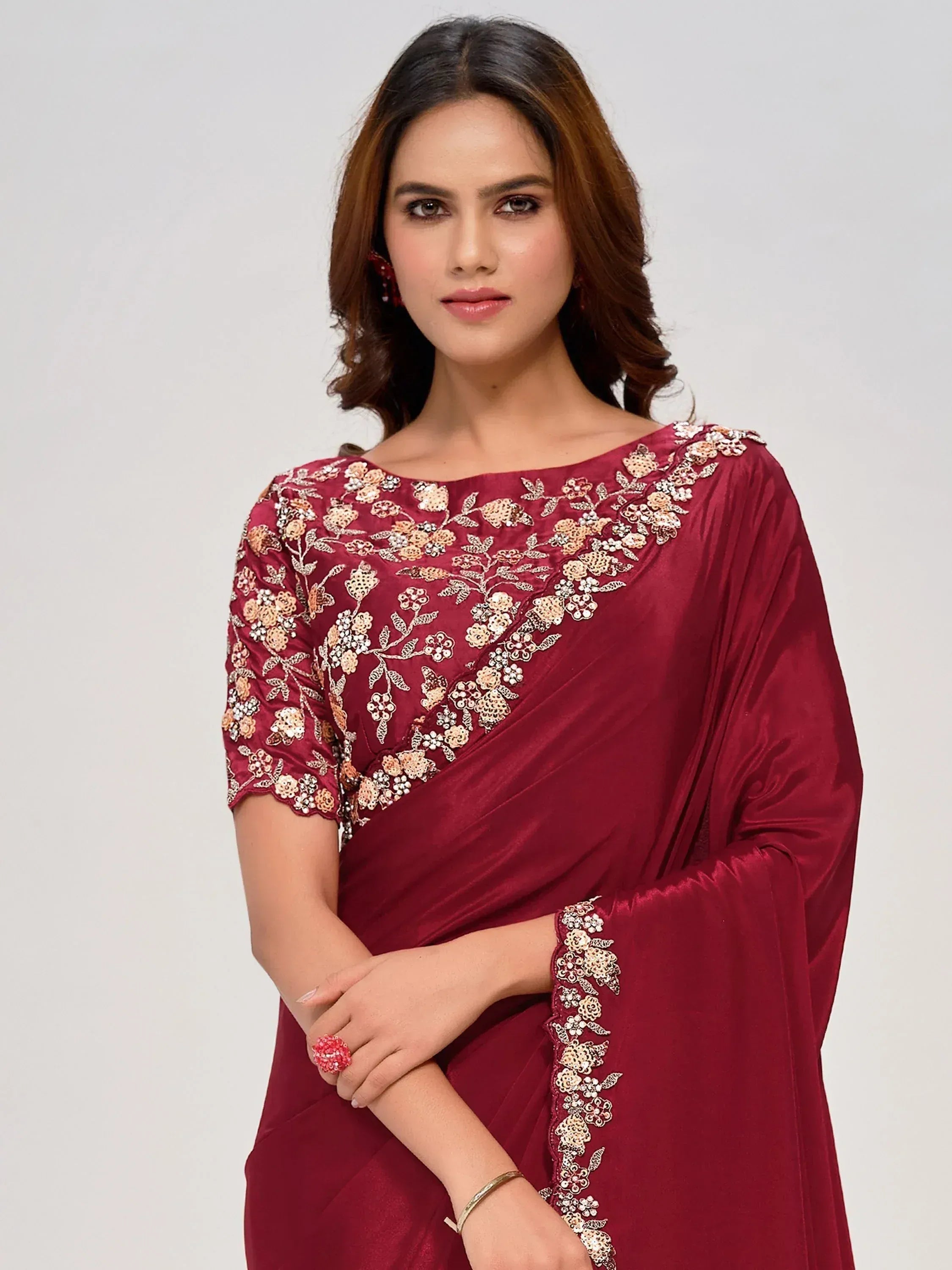 Maroon ethnic saree with floral embroidery, perfect for Indian occasions and festive wear