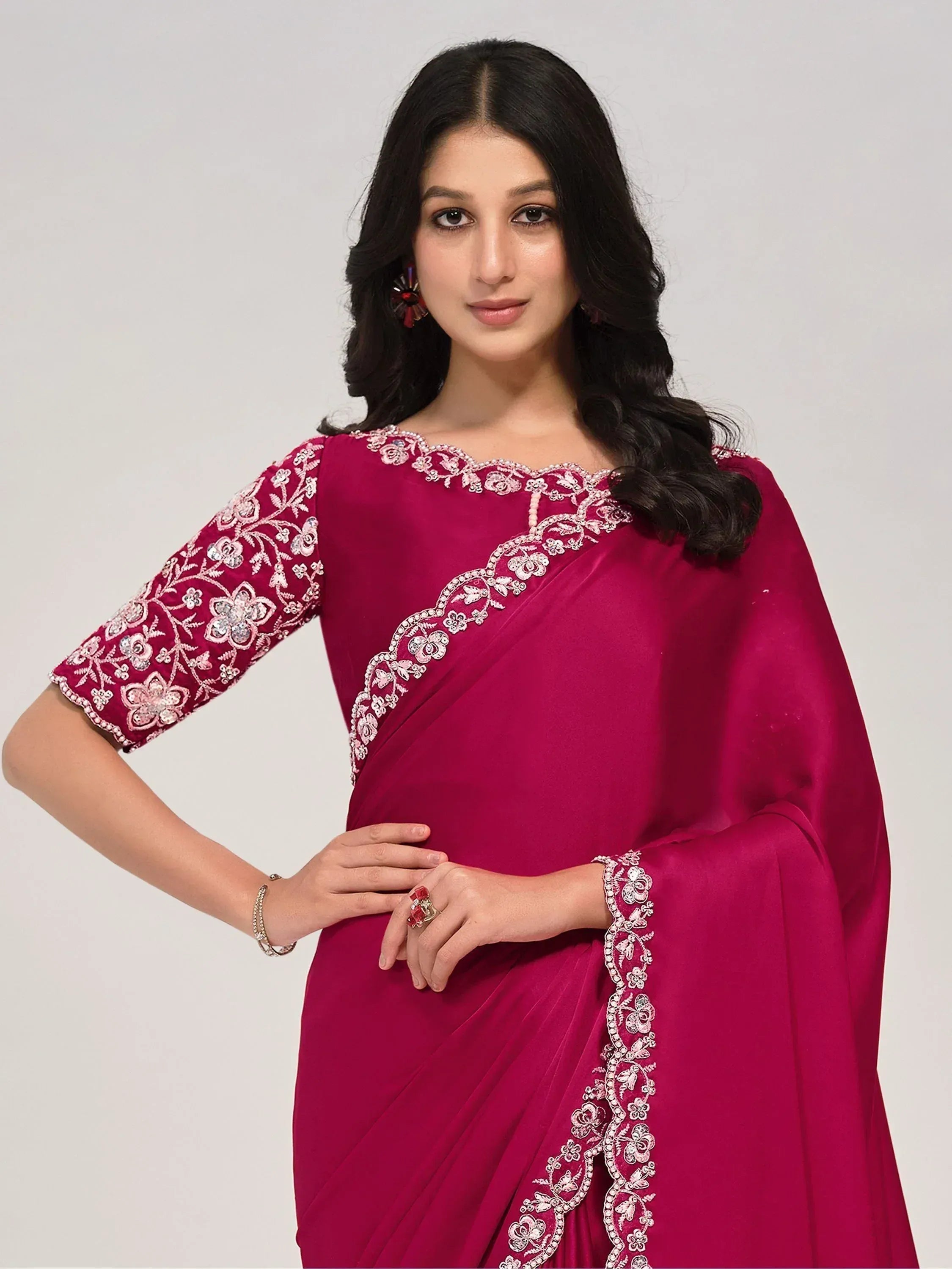 Elegant maroon saree with floral embroidery and sequin detailing, perfect for Indian ethnic occasions