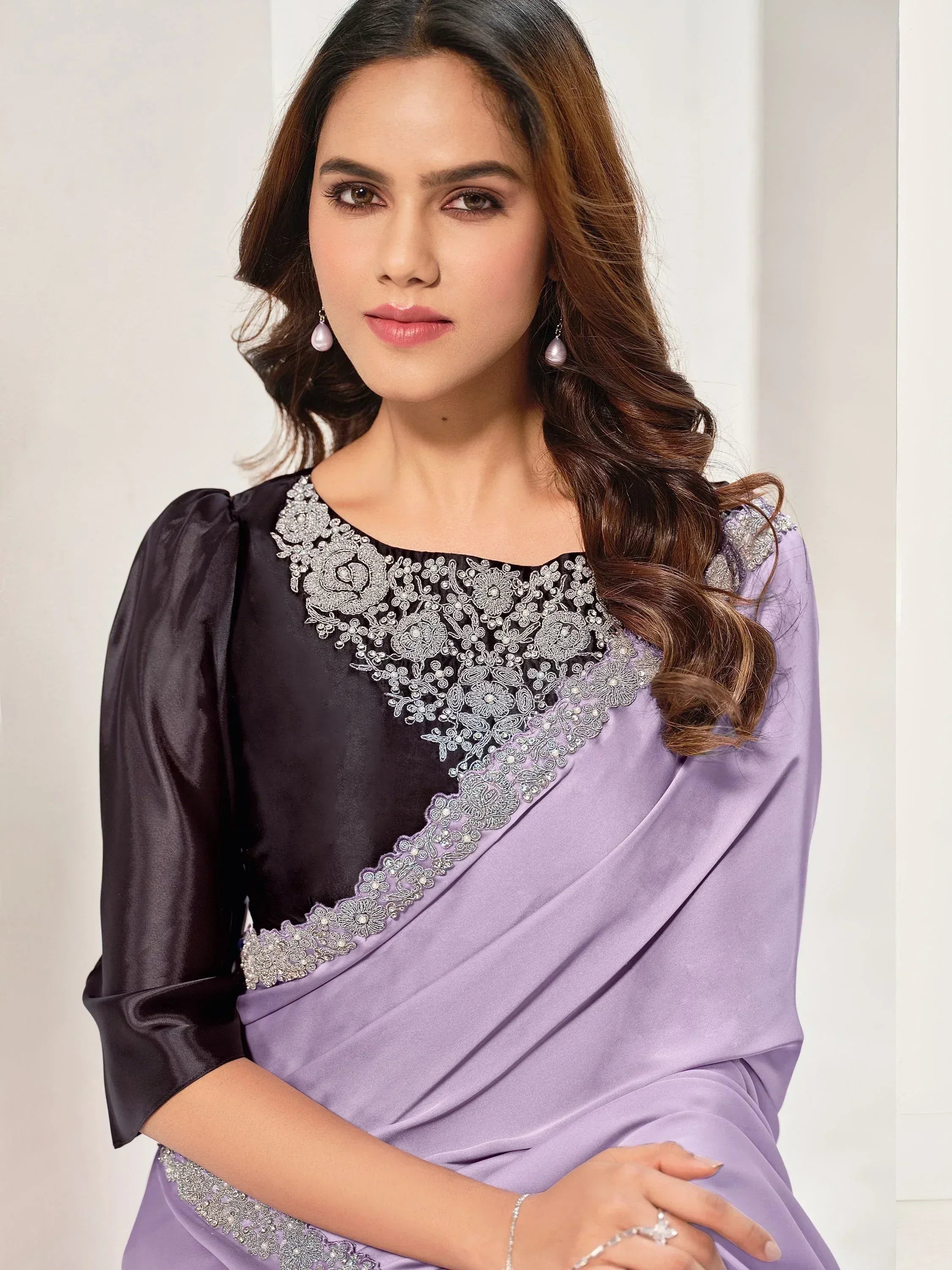 Elegant purple and black saree with floral embroidery, perfect for Indian ethnic occasions