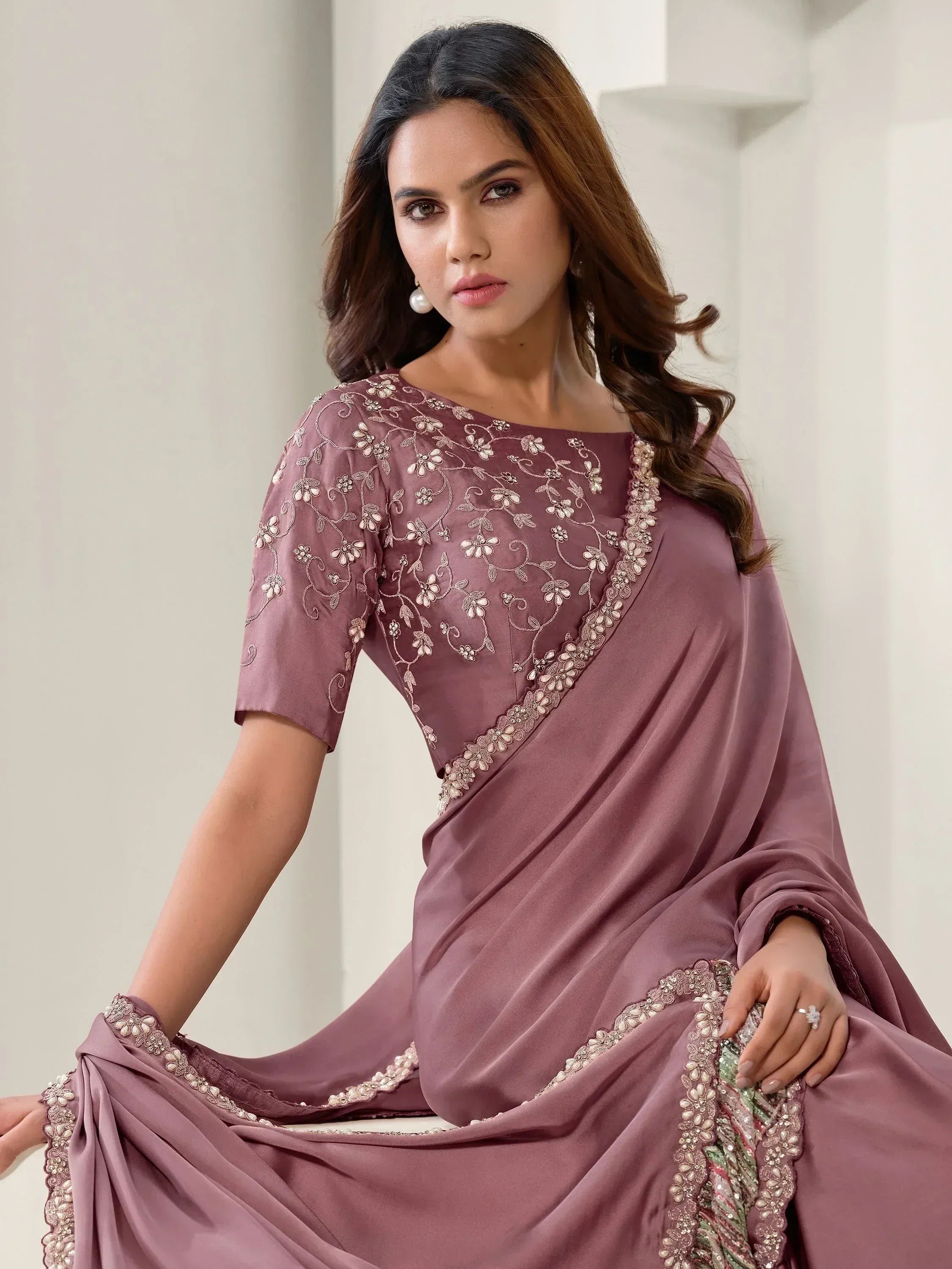 Elegant mauve saree with floral embroidery and pearl detailing, perfect for Indian ethnic occasions