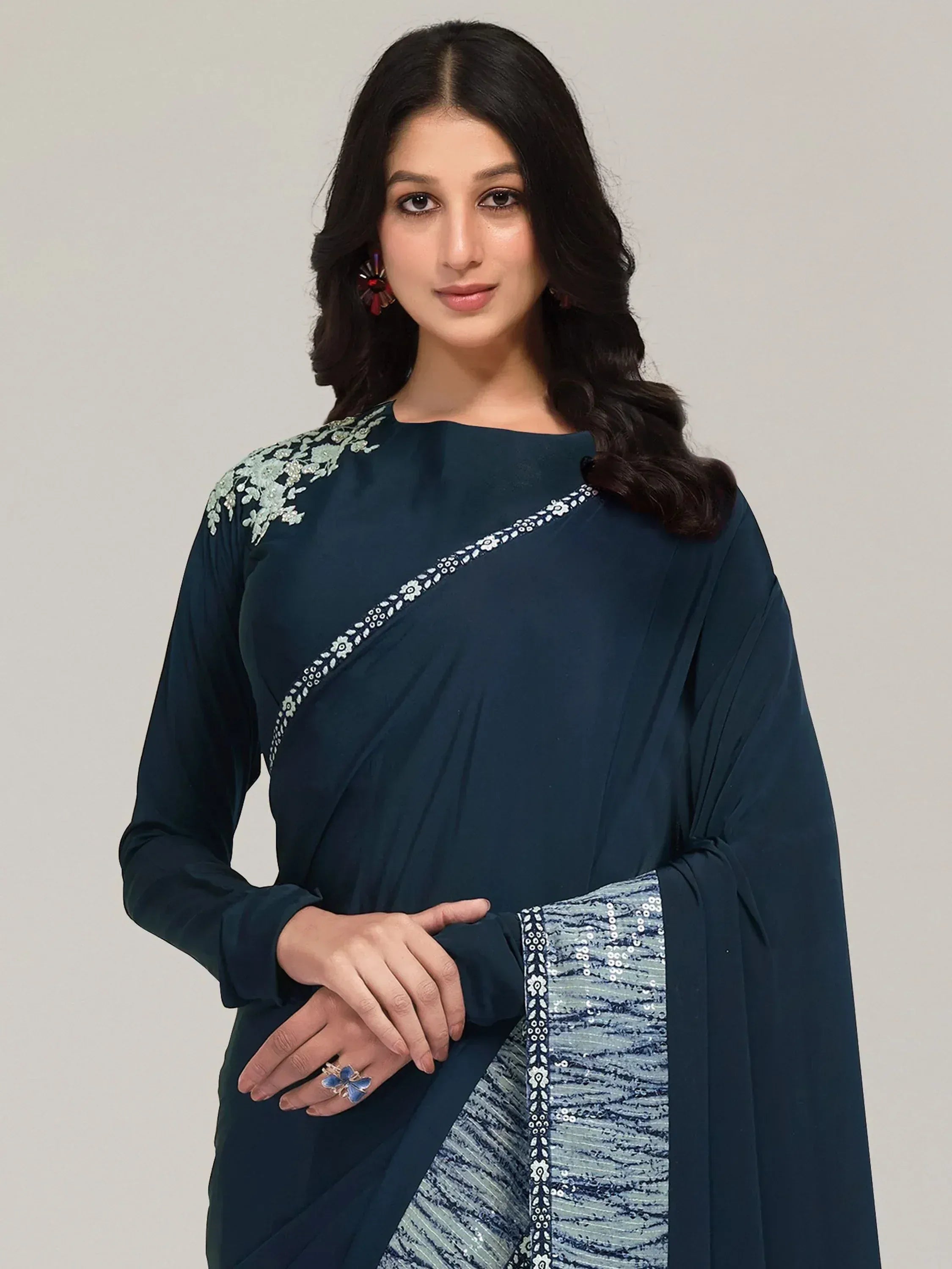 Woman in navy blue embroidered saree with sequin border, Indian ethnic wear