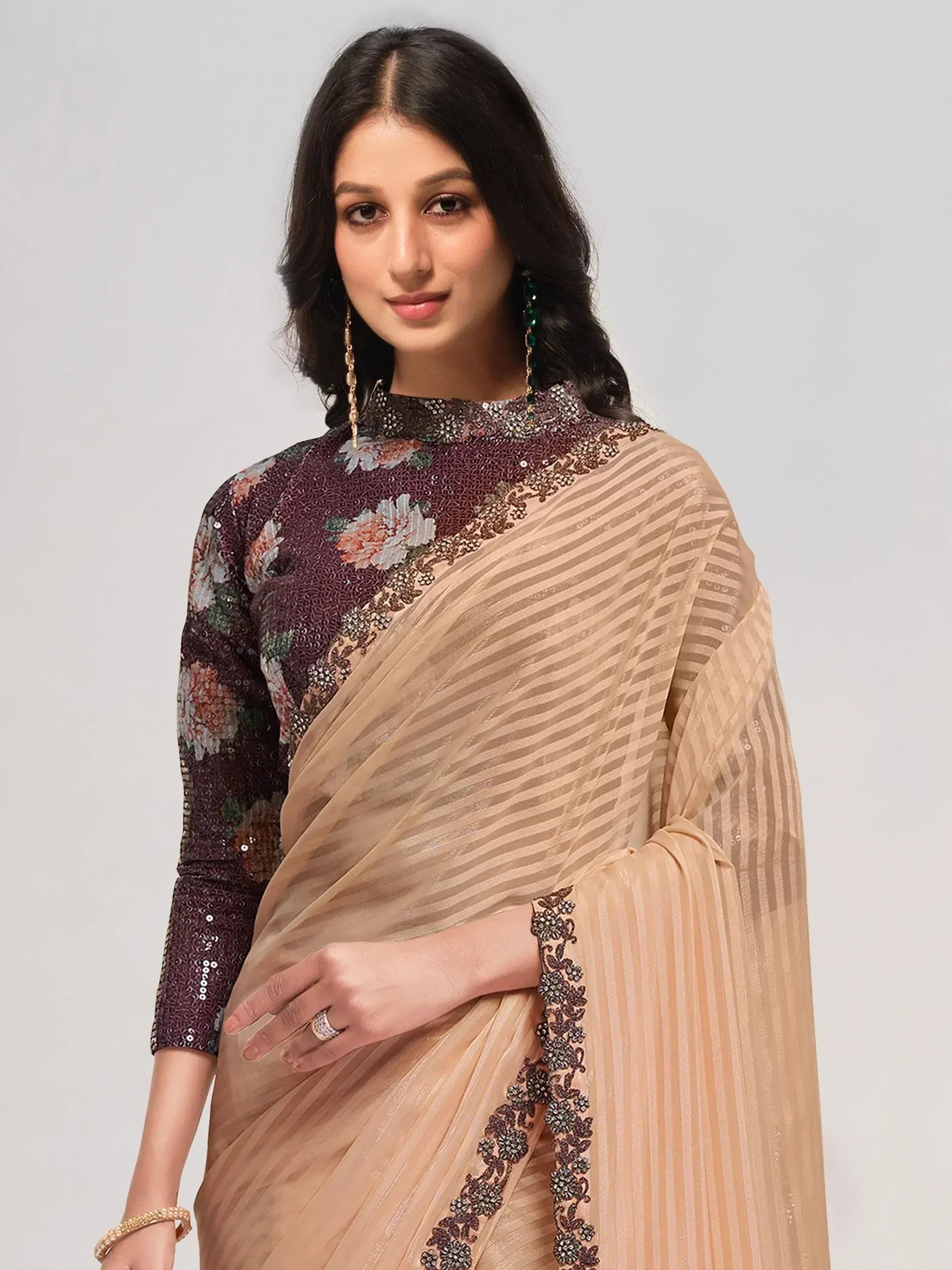 Elegant beige striped saree with floral sequin blouse, perfect for Indian ethnic occasions