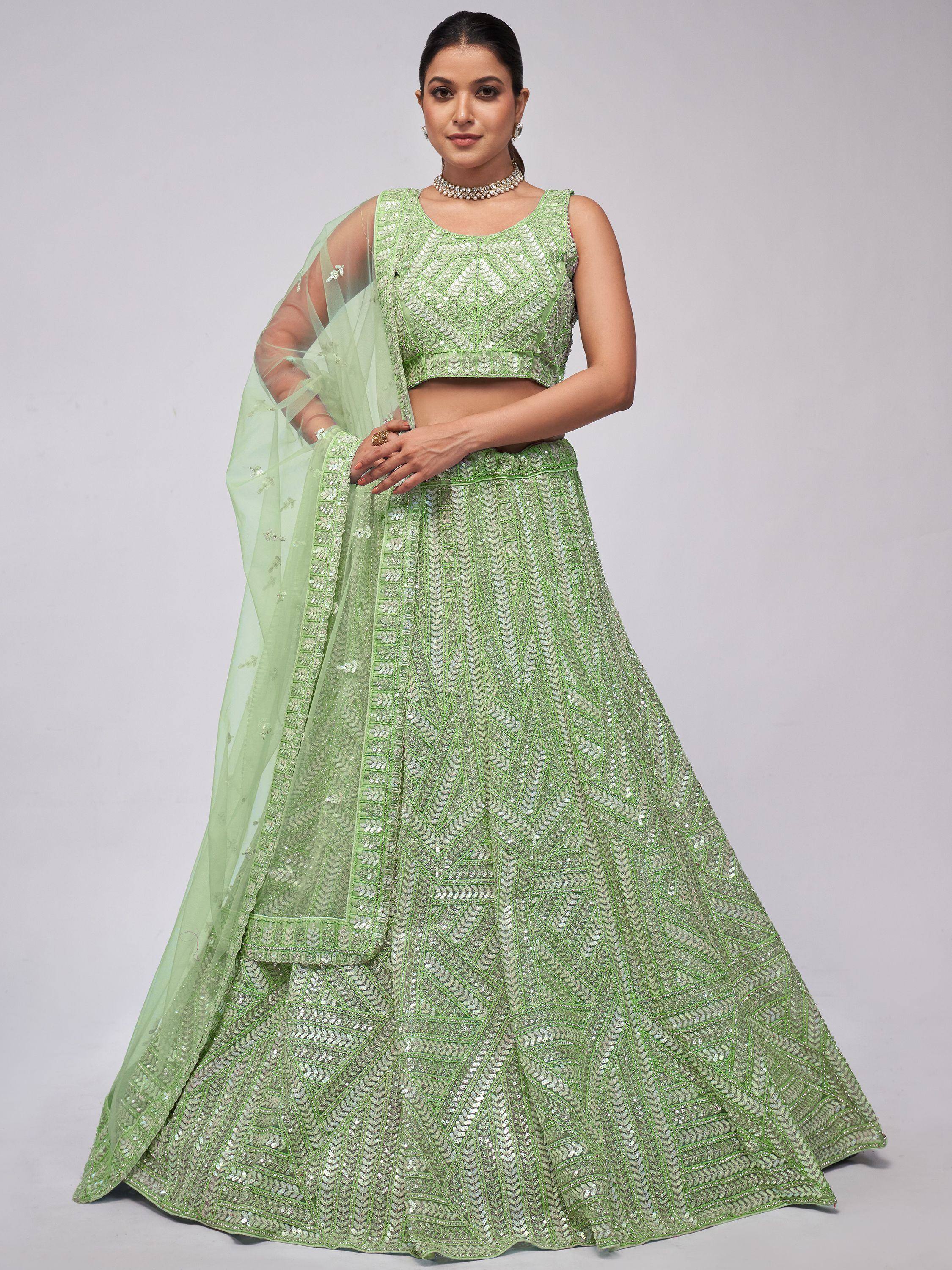 Green embroidered lehenga choli with matching dupatta, perfect for Indian ethnic wear occasions