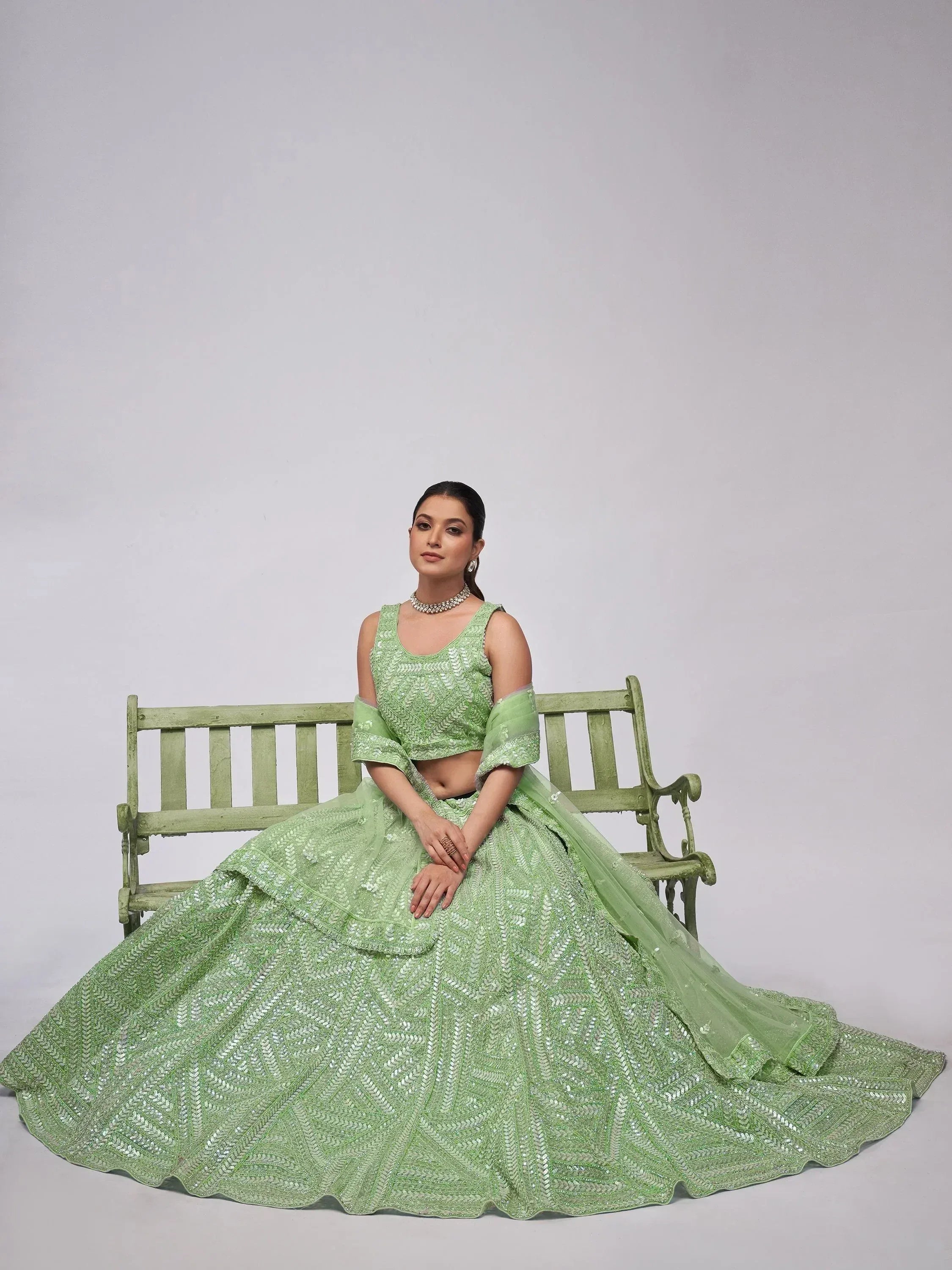 Mint green designer lehenga choli with sequin embroidery, perfect for Indian ethnic wear events