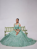 Enchanting Sky Blue Heavy Sequins Net Reception Wear Lehenga Choli
