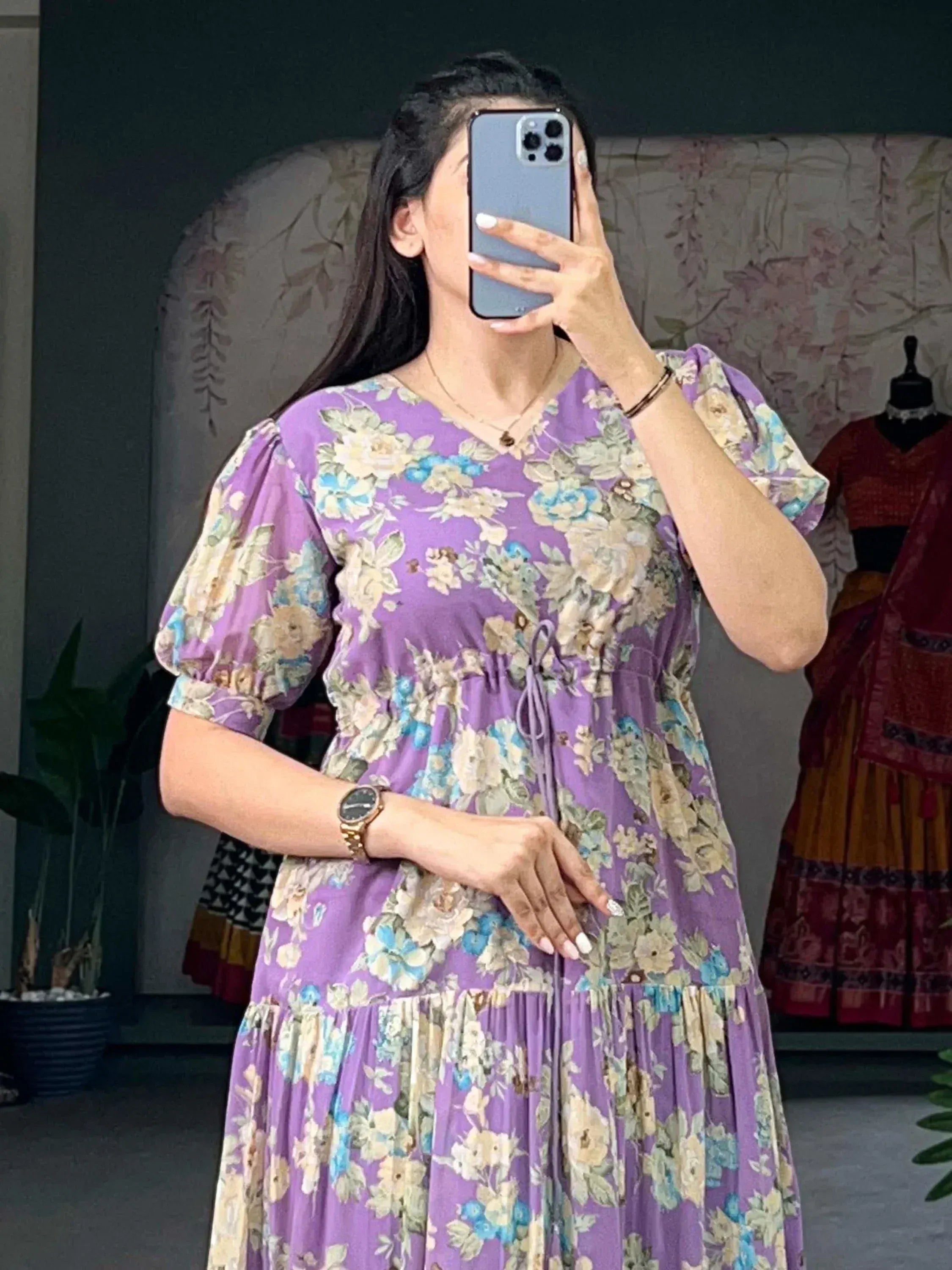 Purple floral ethnic gown with puff sleeves, perfect for Indian occasions and festive wear.