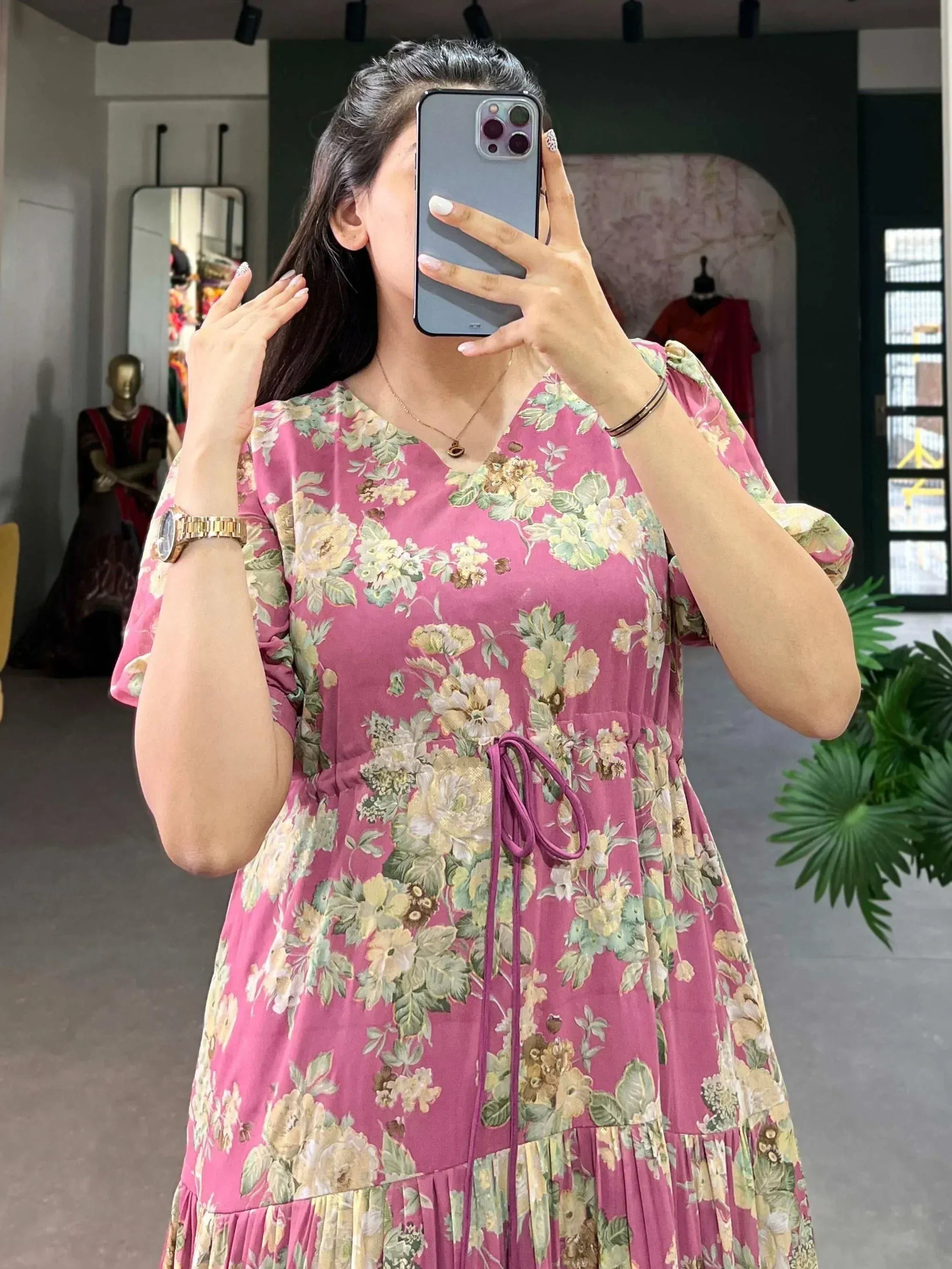 Pink floral ethnic gown with drawstring waist, perfect for casual or festive occasions.
