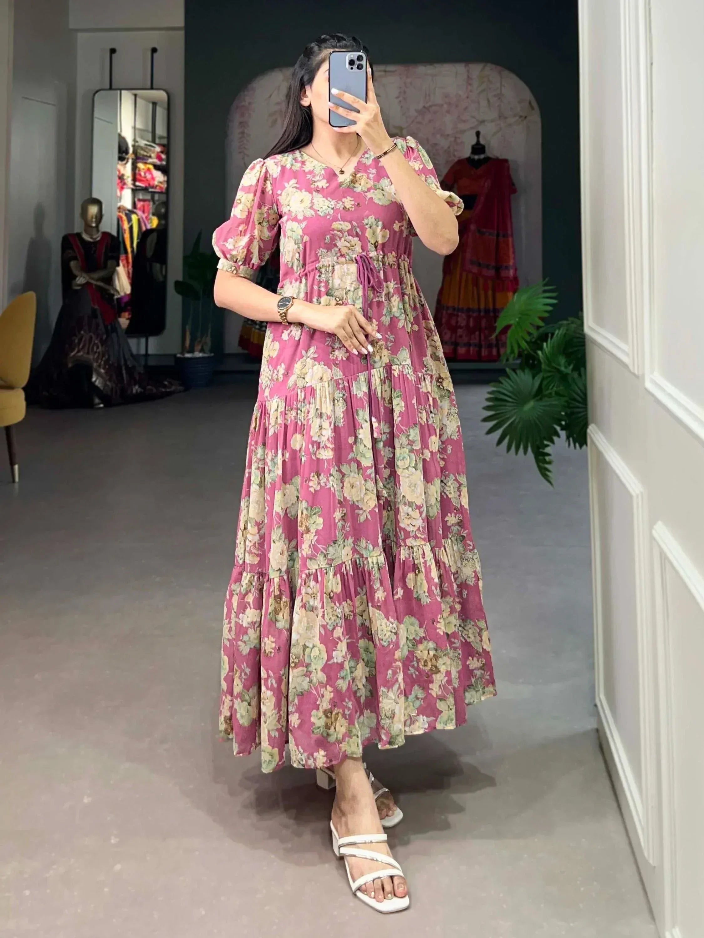 Pink floral tiered maxi dress with puff sleeves, perfect for ethnic occasions and casual wear.