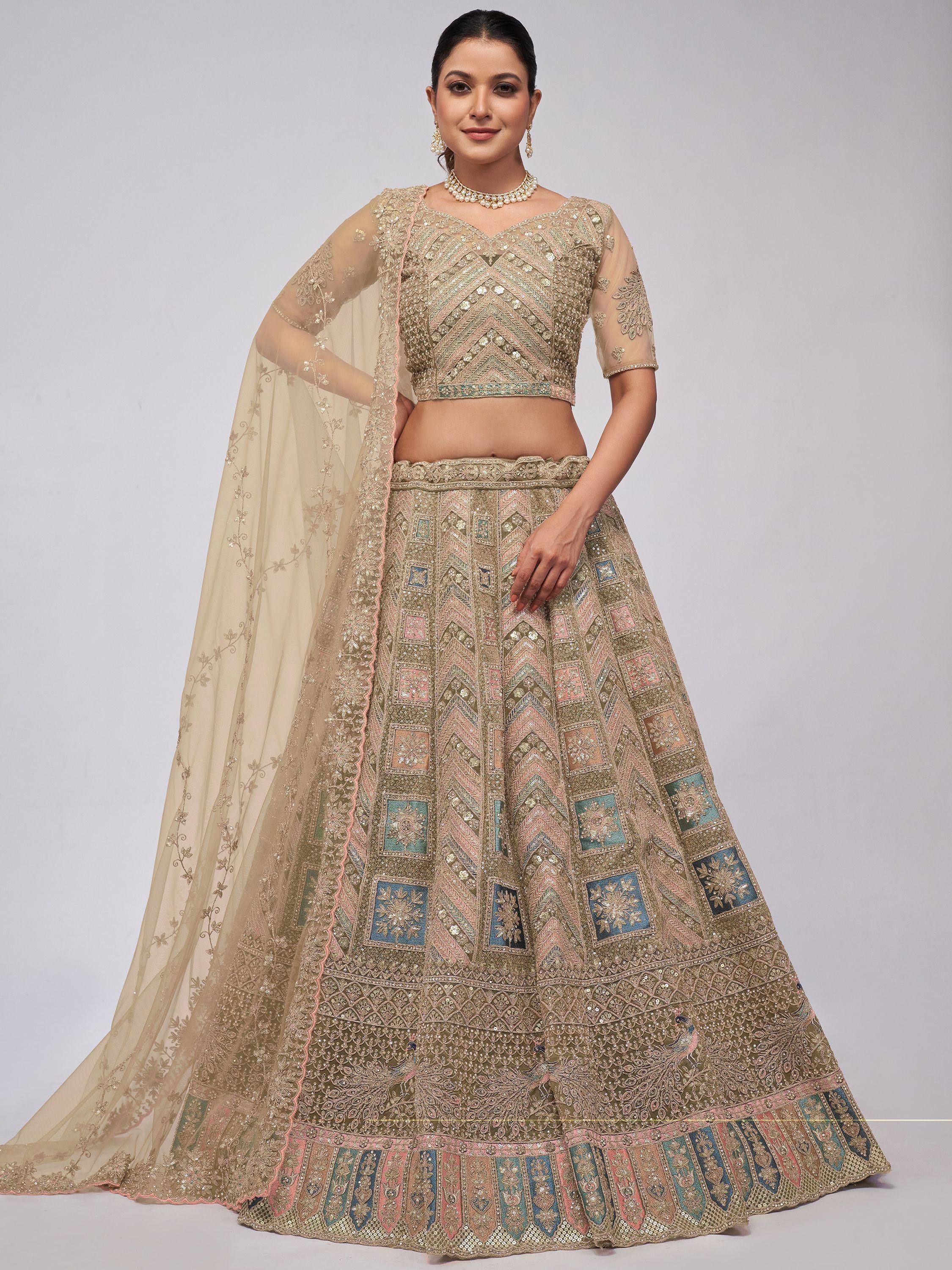 Elegant gold lehenga choli with intricate embroidery, perfect for Indian weddings and festive occasions.